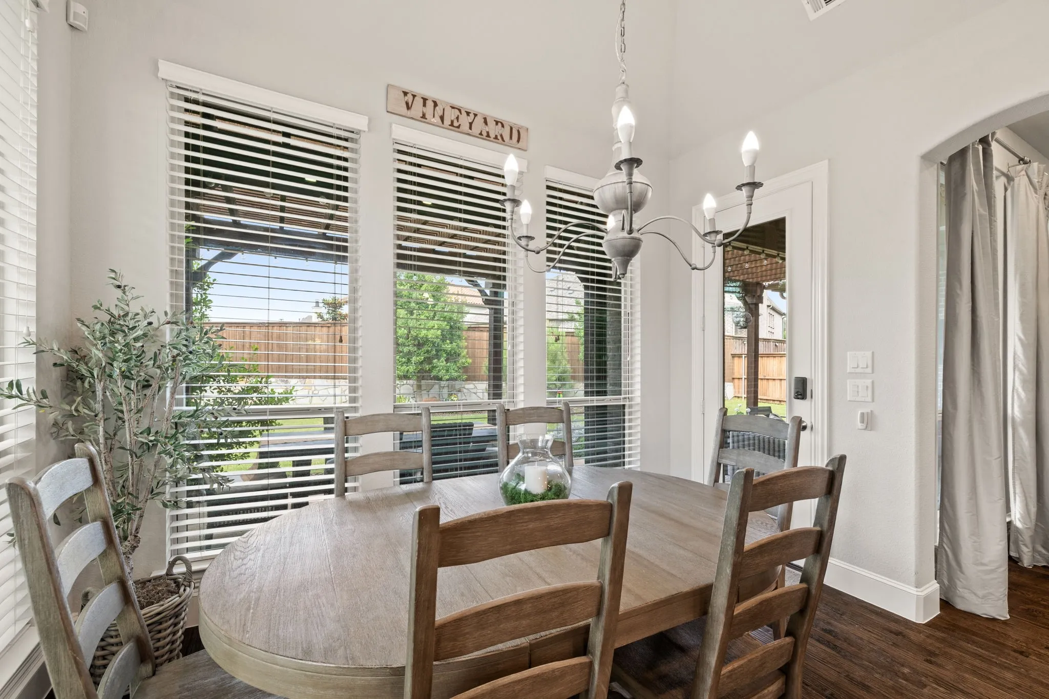 Spacious, light breakfast area with designer lighting.