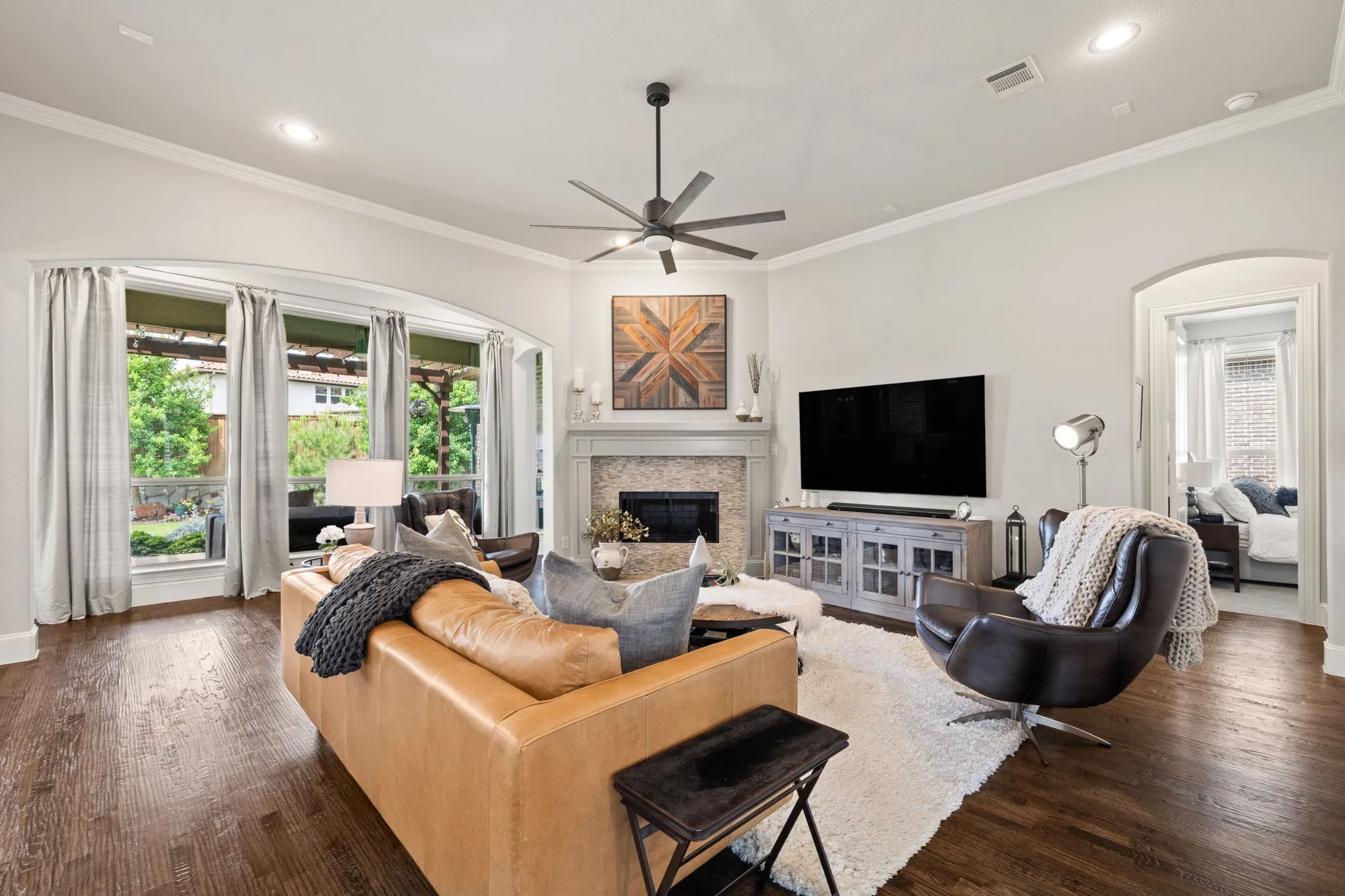 Family room open to kitchen, breakfast and patio.