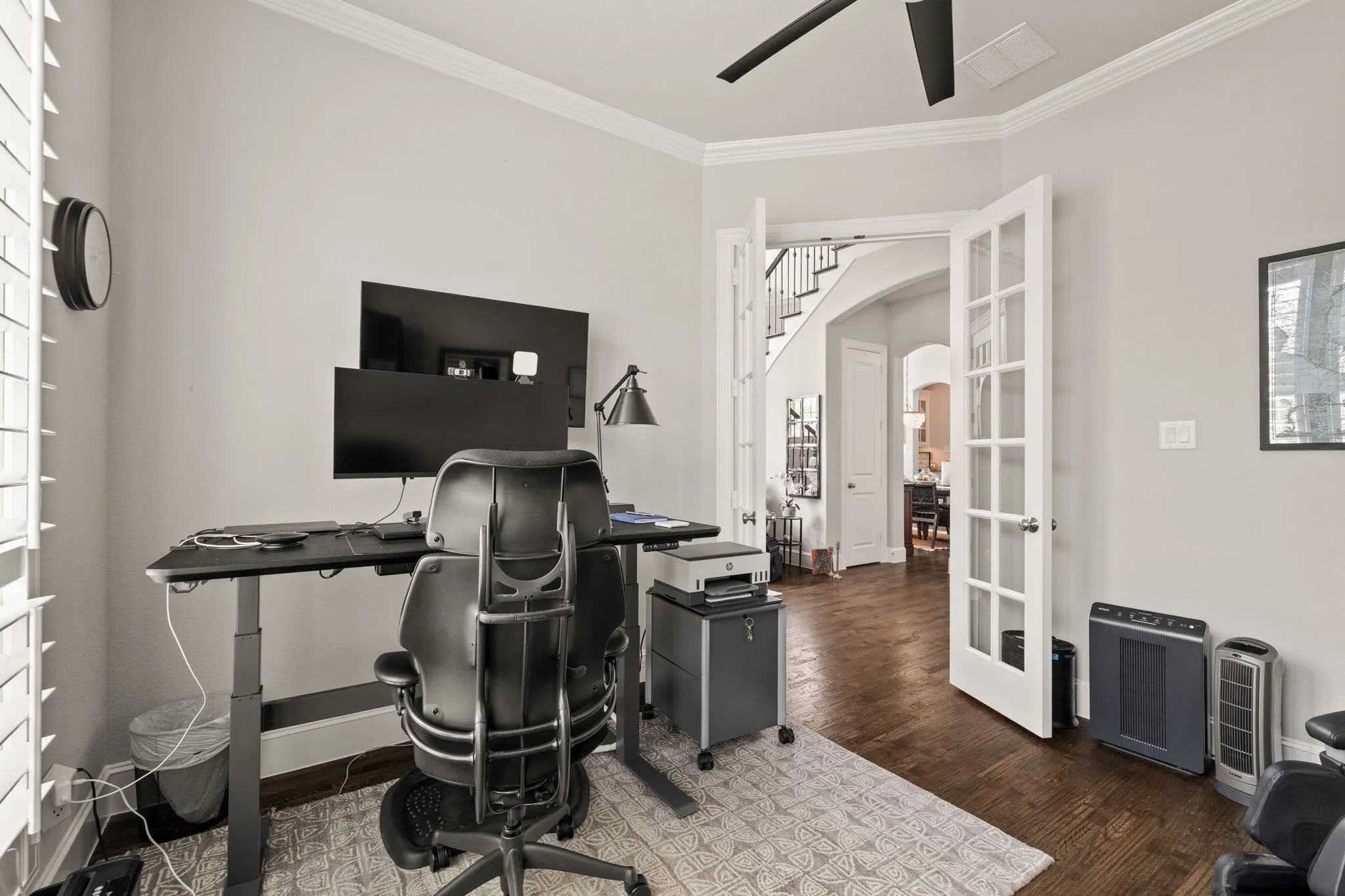 French doors off of entry way to office.