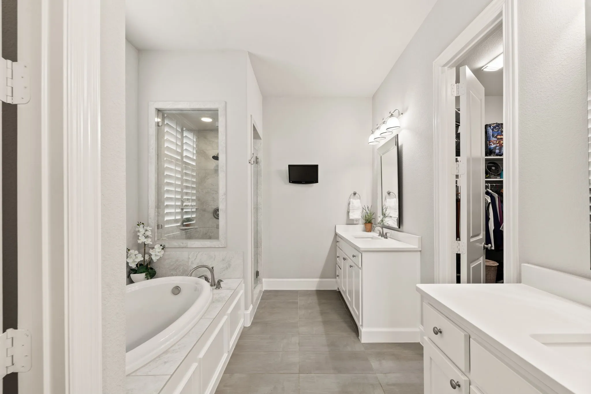 Dual vanities, separate shower and tub.