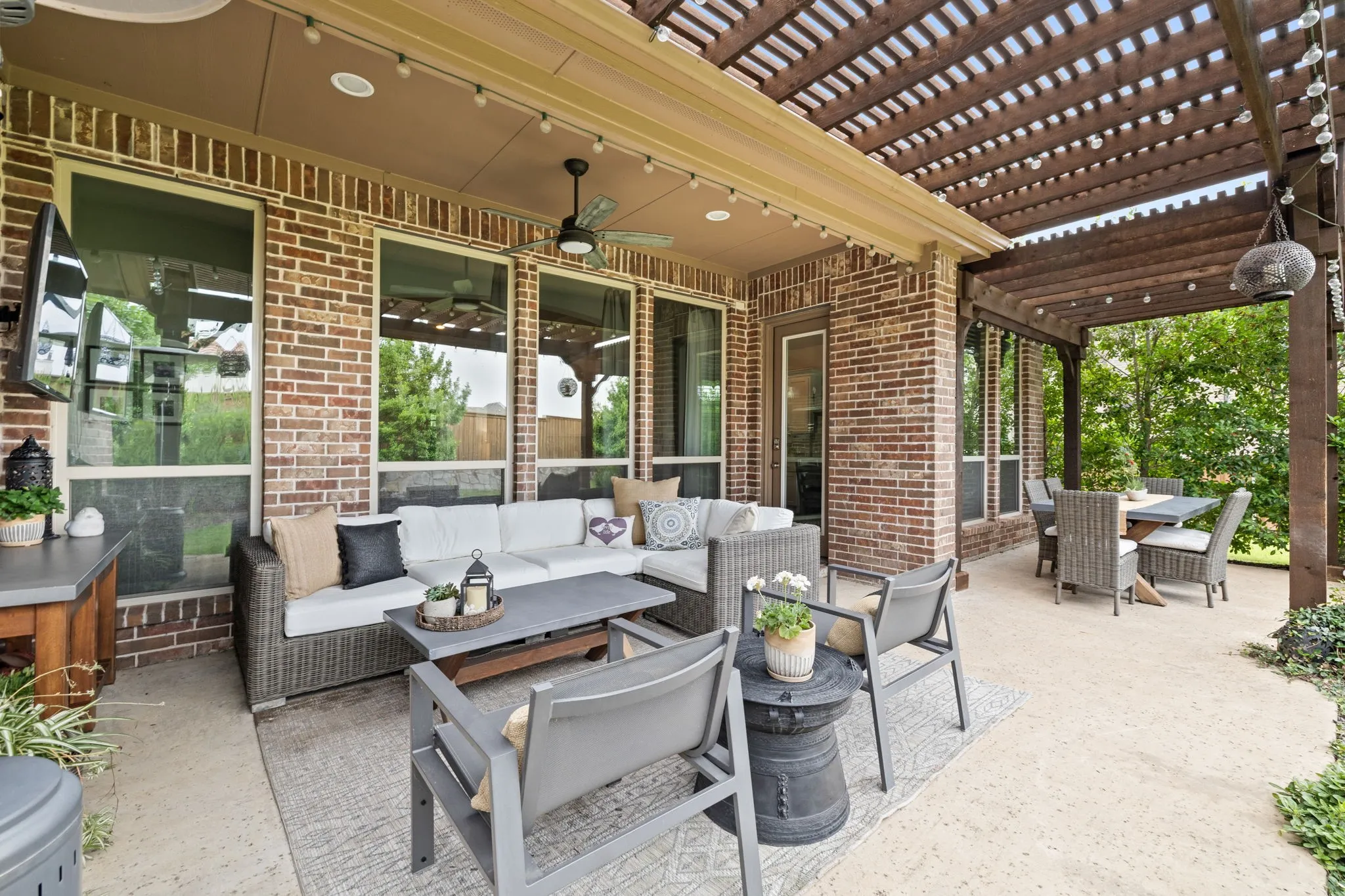 Extended back patio with pergola