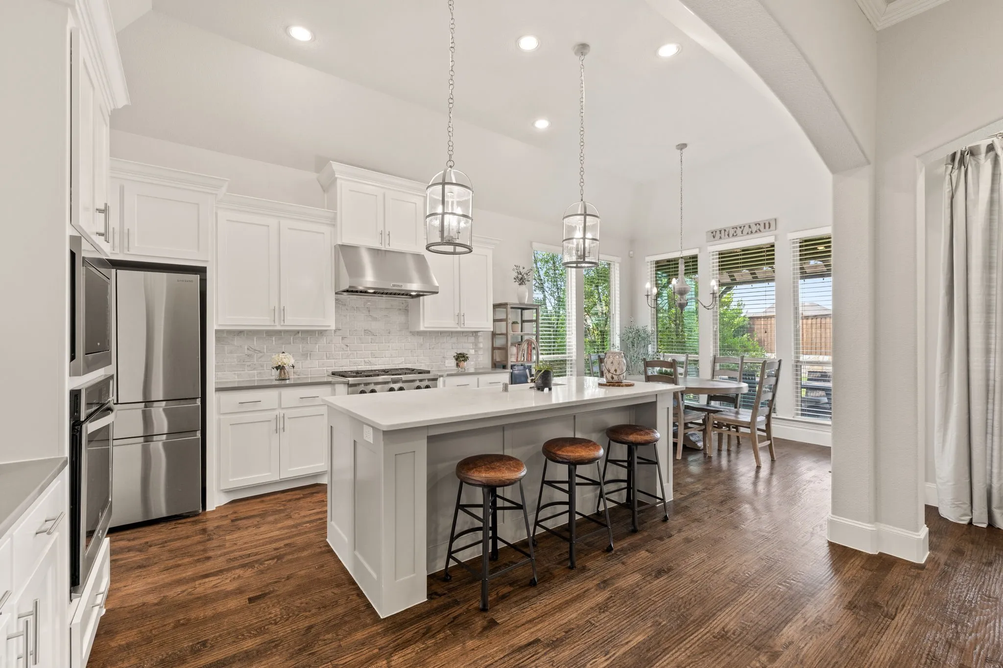Chef's kitchen with quartz, Kitchen Aid, large center island, walk-in pantry, butler's pantry.