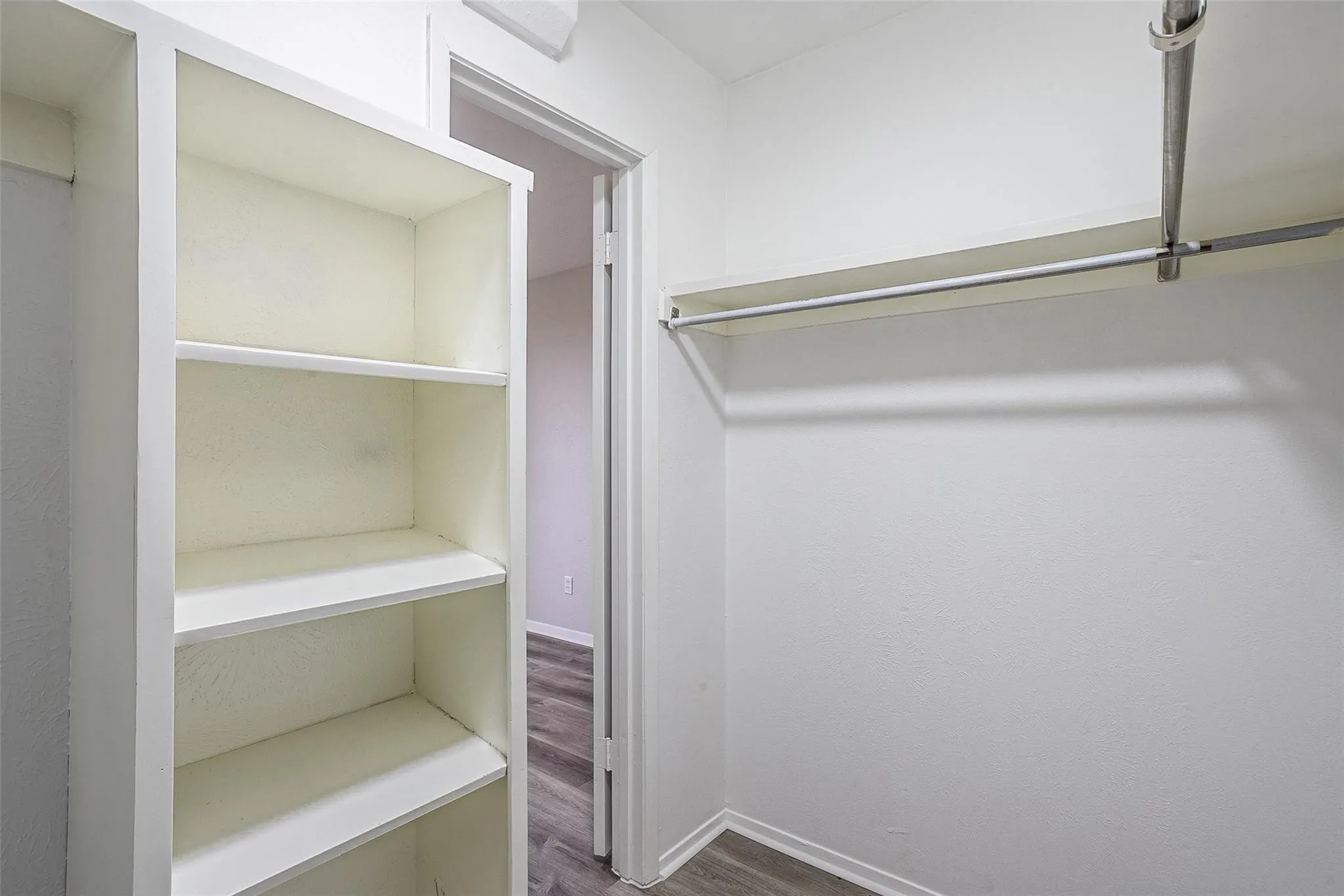 Integrated closet shelving unit featuring multiple open shelves