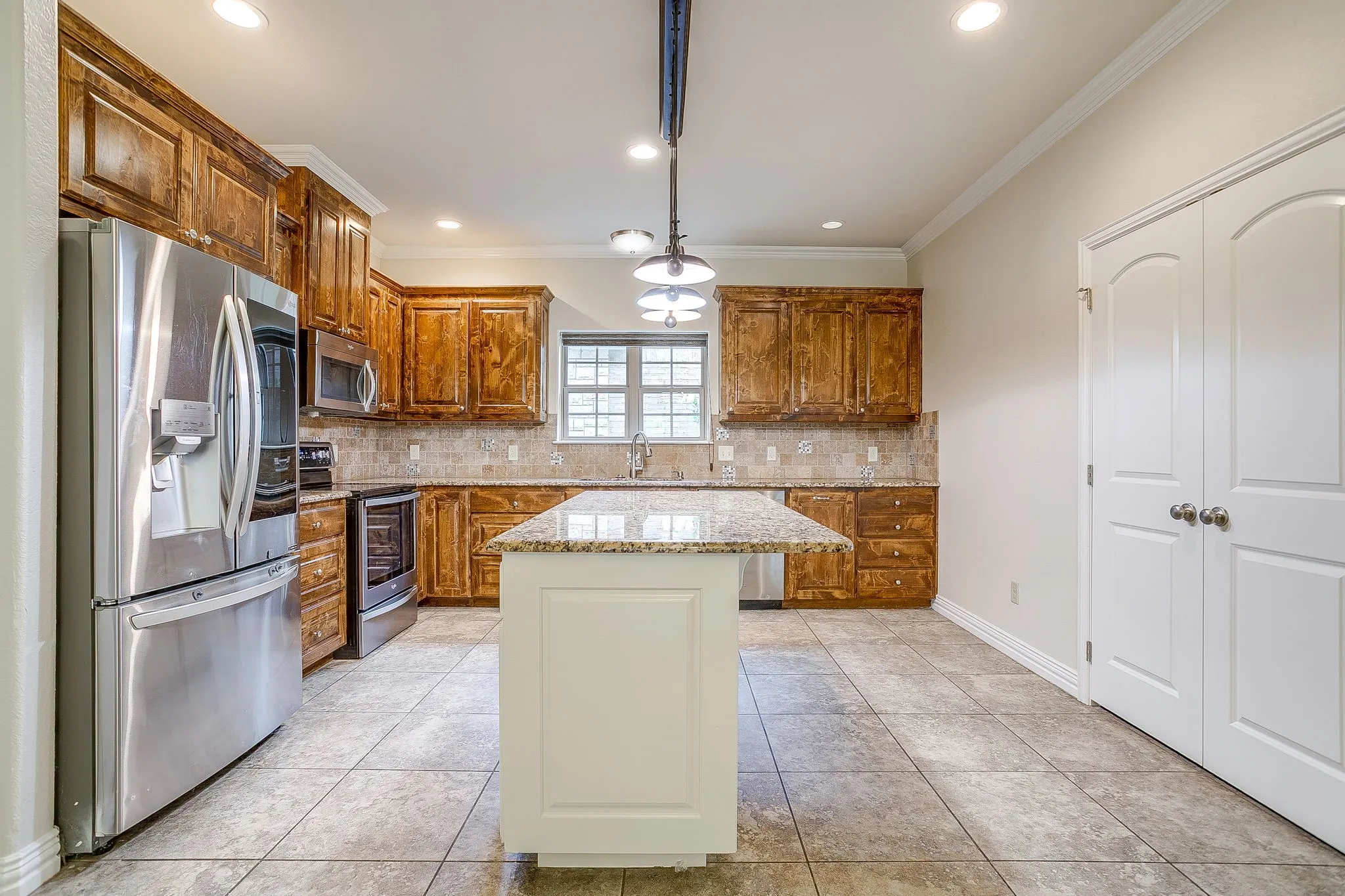 Large double door pantry to the right. Plenty of cabinet space too.