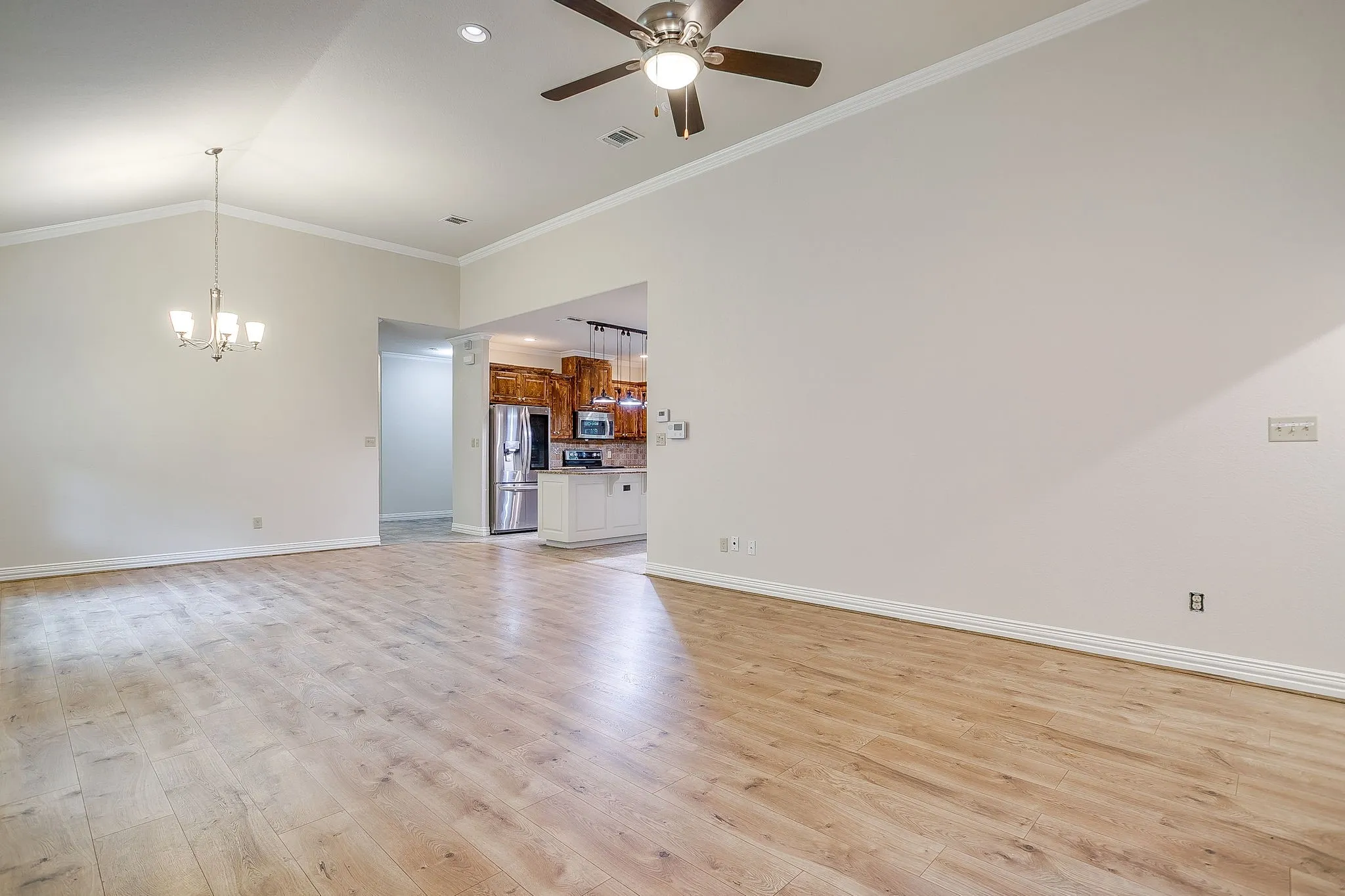 Same large room...lots of room here to use furniture as you wish to separate the space.