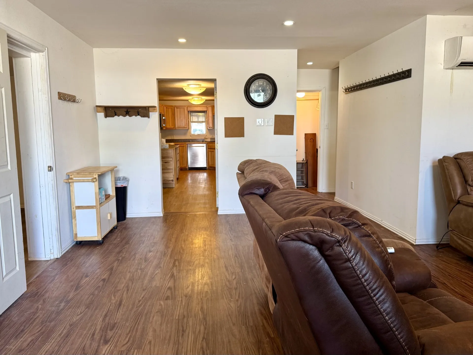 Spacious interior featuring wood-finish flooring throughout