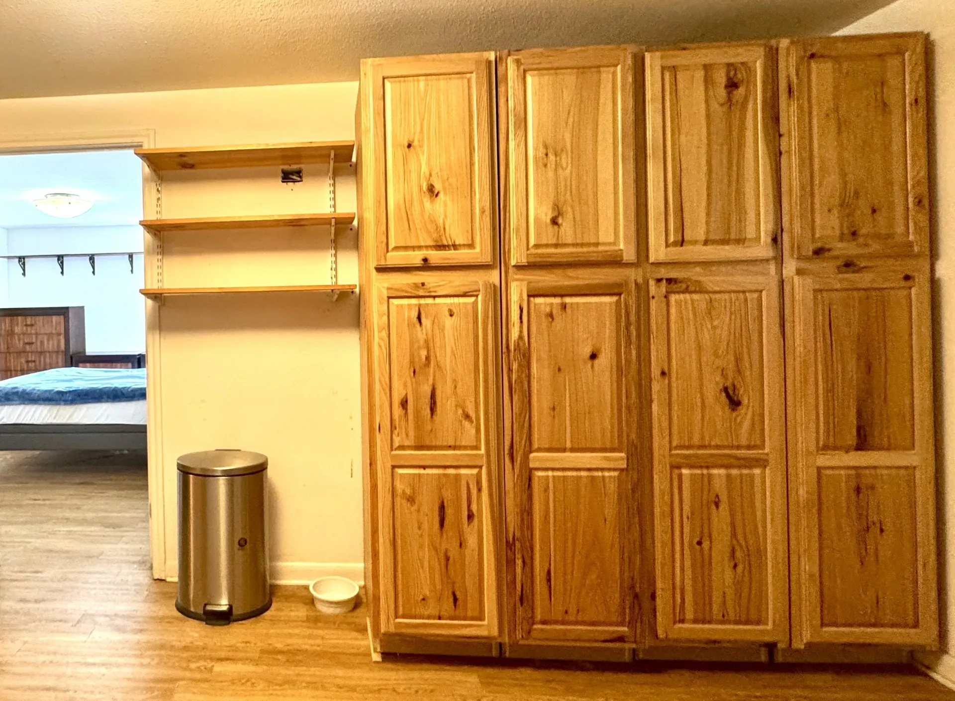 WOW! Loads of Kitchen Wood Cabinets!!  OPENS to Primary Bedroom...