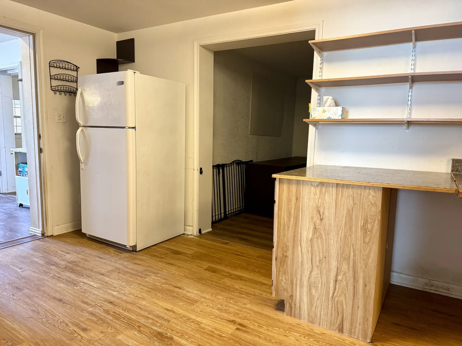 Kitchen area OPENS to DEN...