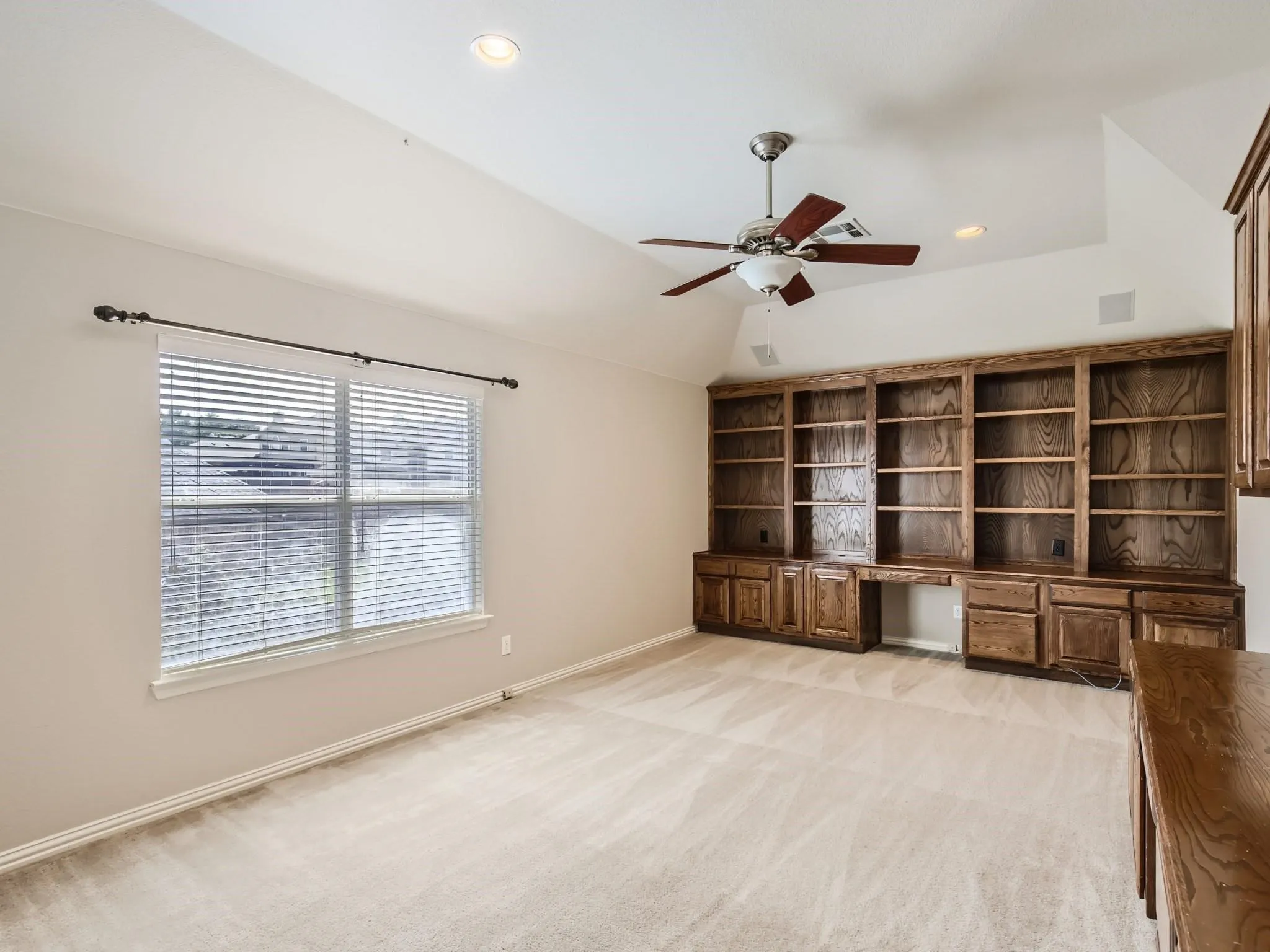 Office with built in cabinetry, could also serve as a game room, flex room, additional bedroom