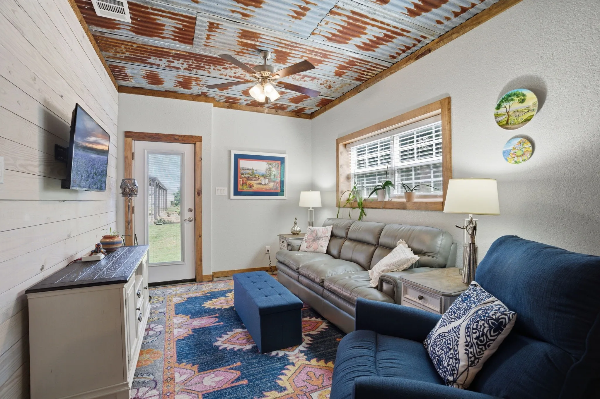 Living space (15X10) is comfortable and has shiplap and flat screen wiring