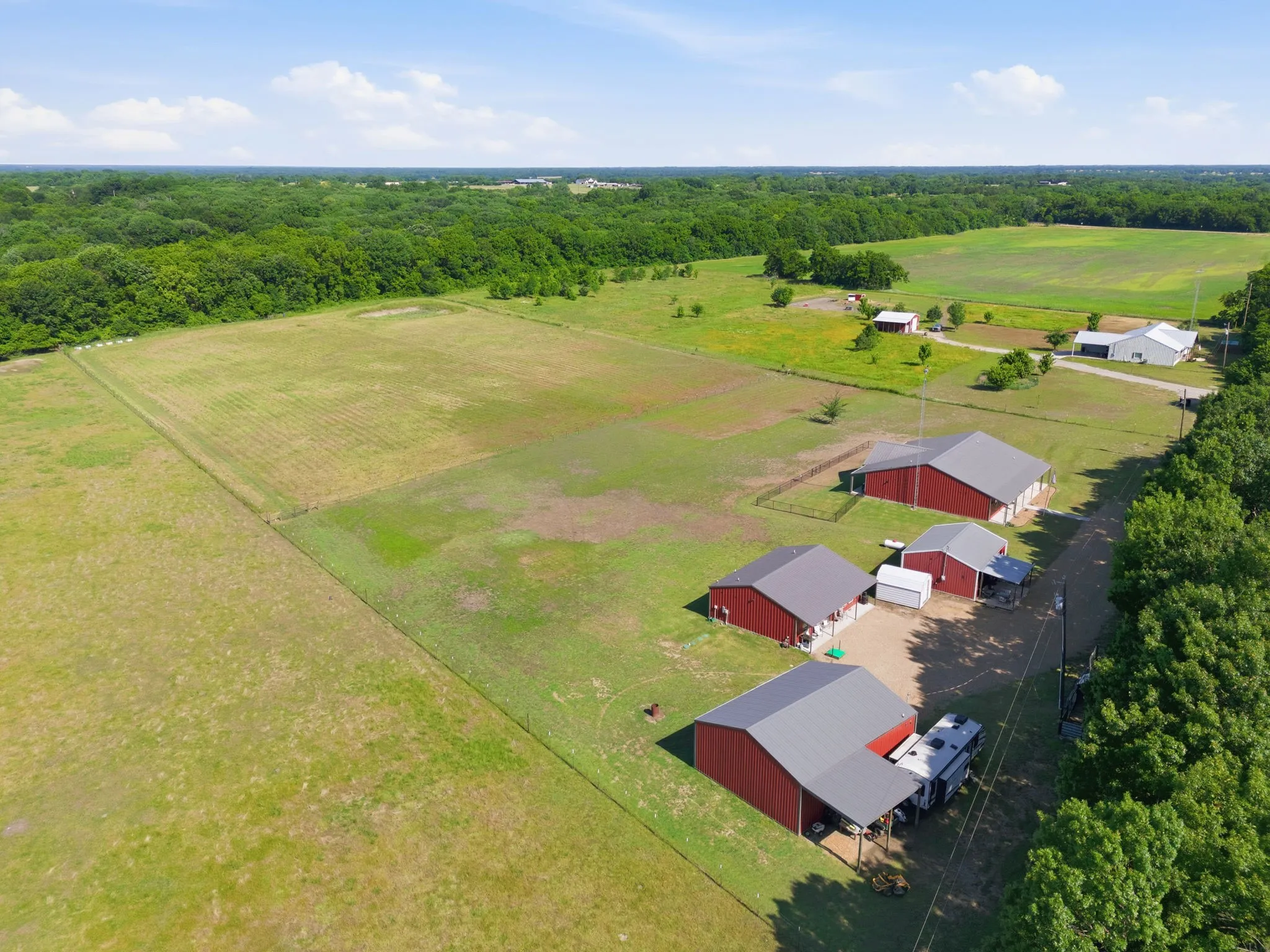 3 homes and a shop. Pasture is approximately 6 acres. Entire property is 9 acres. Owners have bees on the property now and  6 acres will qualify for ag exemption next year.