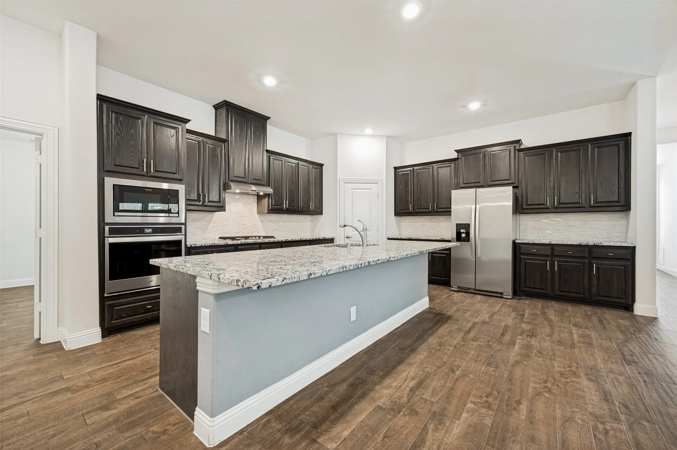 Oversized kitchen island is perfect for entertaining