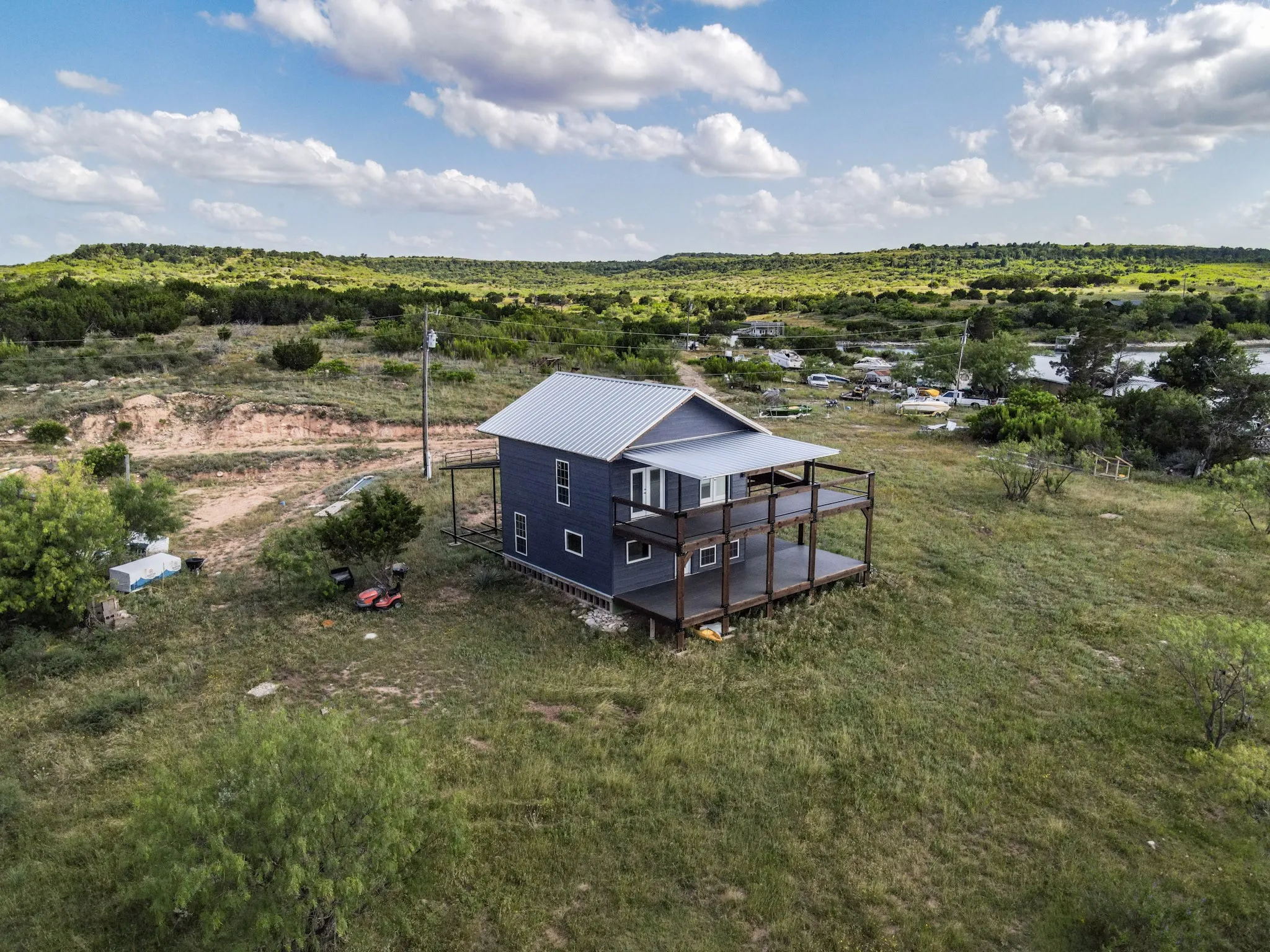 Single Family Residence For Sale in Palo Pinto County , 3500 Hog Bend 121, Possum Kingdom Lake, Texas 76449, 2 Bedrooms, 1 Bathroom, Garage spaces, 1,248 Sqft, built in 2021, Price $345,000, mls#21257713, Real Estate Agent in Possum Kingdom Lake, Homes For Sale in Palo Pinto county, Homes For Sale in Possum Kingdom Lake, Realtor in Possum Kingdom Lake Texas, Real Estate Brokerage Independent Realty Texas, Luminita Cordes Realtor