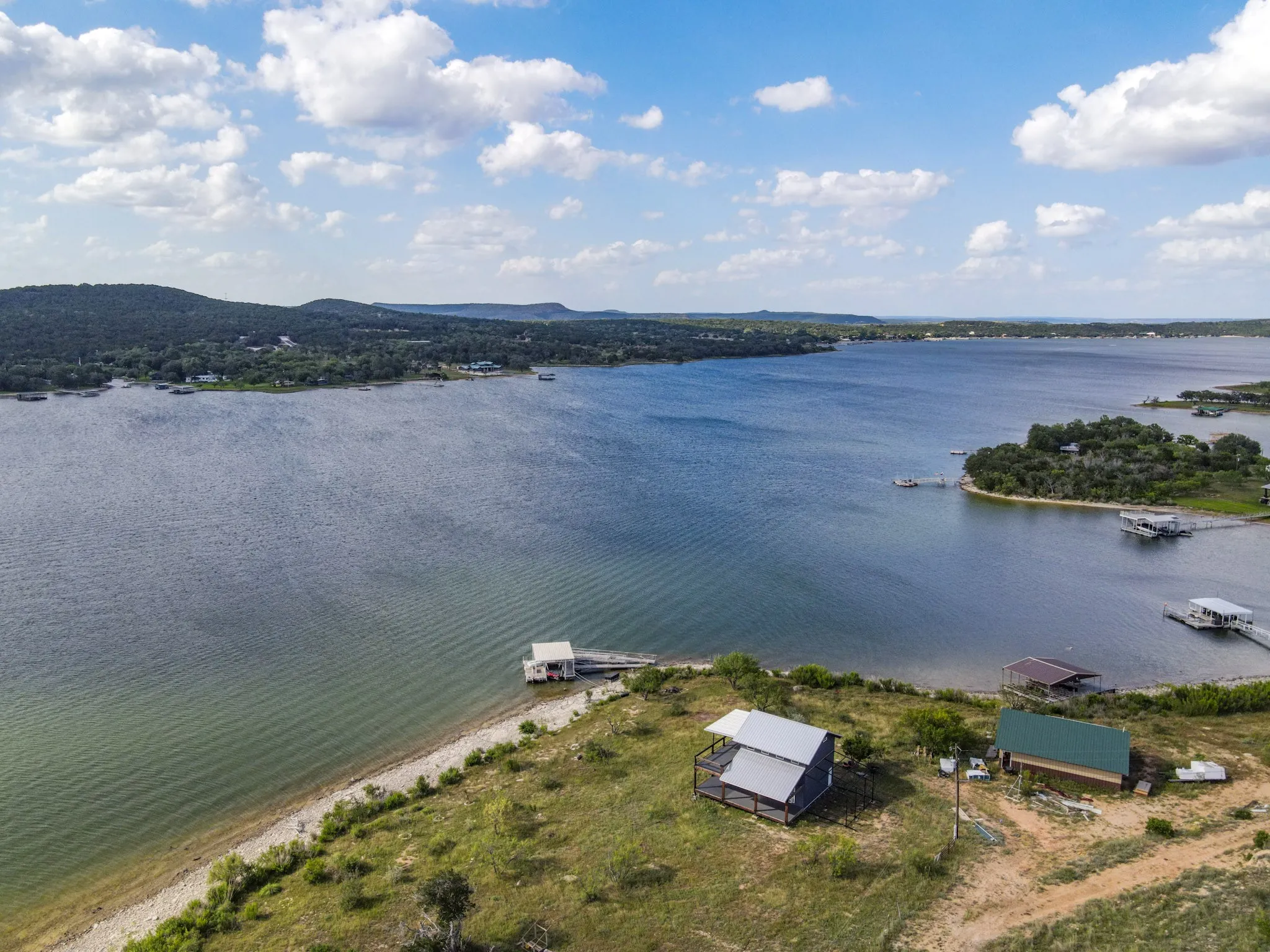 Single Family Residence For Sale in Palo Pinto County , 3500 Hog Bend 121, Possum Kingdom Lake, Texas 76449, 2 Bedrooms, 1 Bathroom, Garage spaces, 1,248 Sqft, built in 2021, Price $345,000, mls#21257713, Real Estate Agent in Possum Kingdom Lake, Homes For Sale in Palo Pinto county, Homes For Sale in Possum Kingdom Lake, Realtor in Possum Kingdom Lake Texas, Real Estate Brokerage Independent Realty Texas, Luminita Cordes Realtor