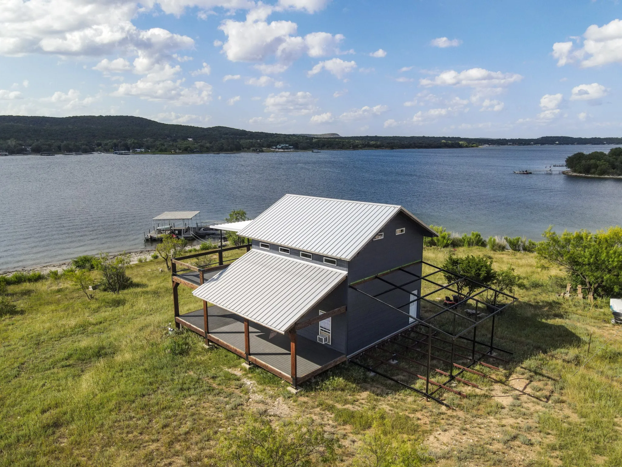 Single Family Residence For Sale in Palo Pinto County , 3500 Hog Bend 121, Possum Kingdom Lake, Texas 76449, 2 Bedrooms, 1 Bathroom, Garage spaces, 1,248 Sqft, built in 2021, Price $345,000, mls#21257713, Real Estate Agent in Possum Kingdom Lake, Homes For Sale in Palo Pinto county, Homes For Sale in Possum Kingdom Lake, Realtor in Possum Kingdom Lake Texas, Real Estate Brokerage Independent Realty Texas, Luminita Cordes Realtor