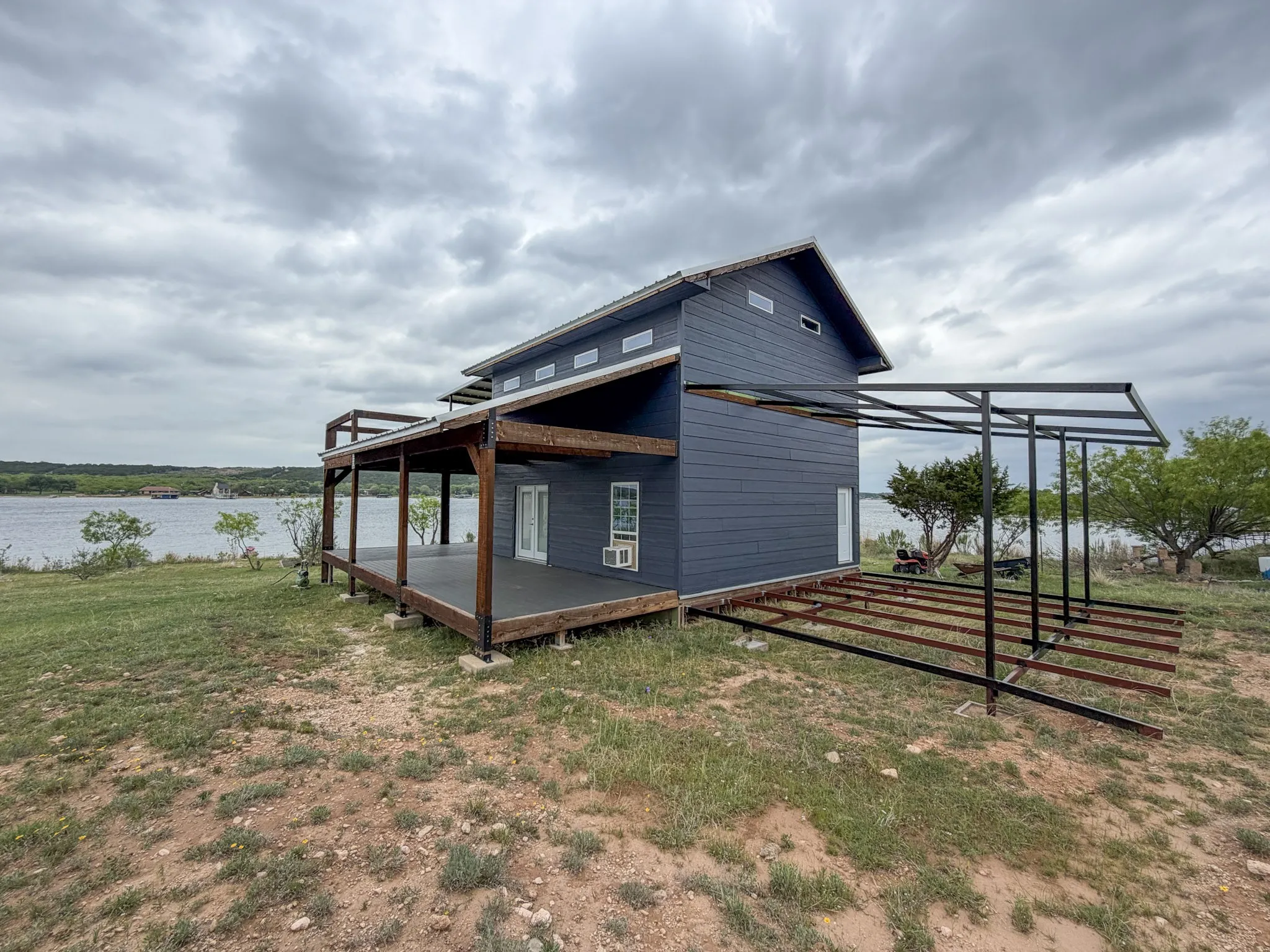 Single Family Residence For Sale in Palo Pinto County , 3500 Hog Bend 121, Possum Kingdom Lake, Texas 76449, 2 Bedrooms, 1 Bathroom, Garage spaces, 1,248 Sqft, built in 2021, Price $345,000, mls#21257713, Real Estate Agent in Possum Kingdom Lake, Homes For Sale in Palo Pinto county, Homes For Sale in Possum Kingdom Lake, Realtor in Possum Kingdom Lake Texas, Real Estate Brokerage Independent Realty Texas, Luminita Cordes Realtor
