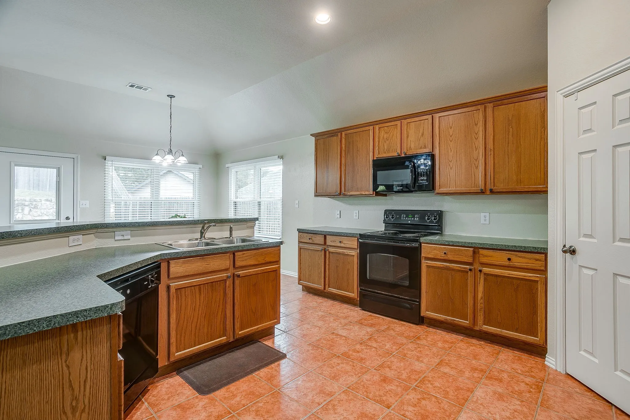 Spacious Kitchen with ample storage and counter space