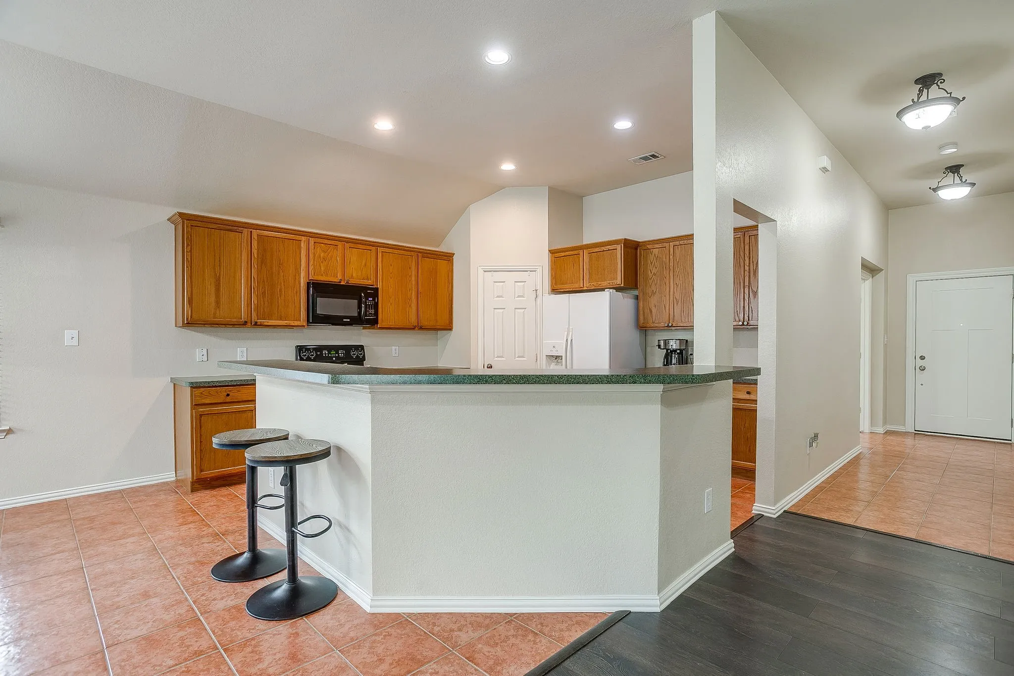Spacious Kitchen with ample storage and counter space
