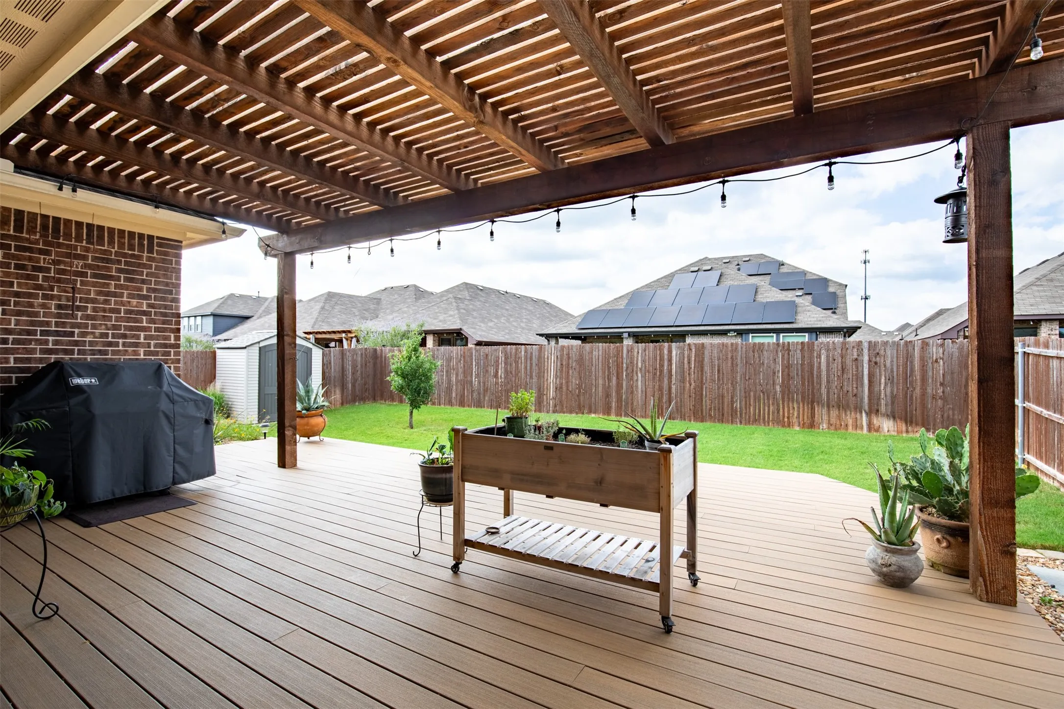 Large patio with pergola, great for grilling!