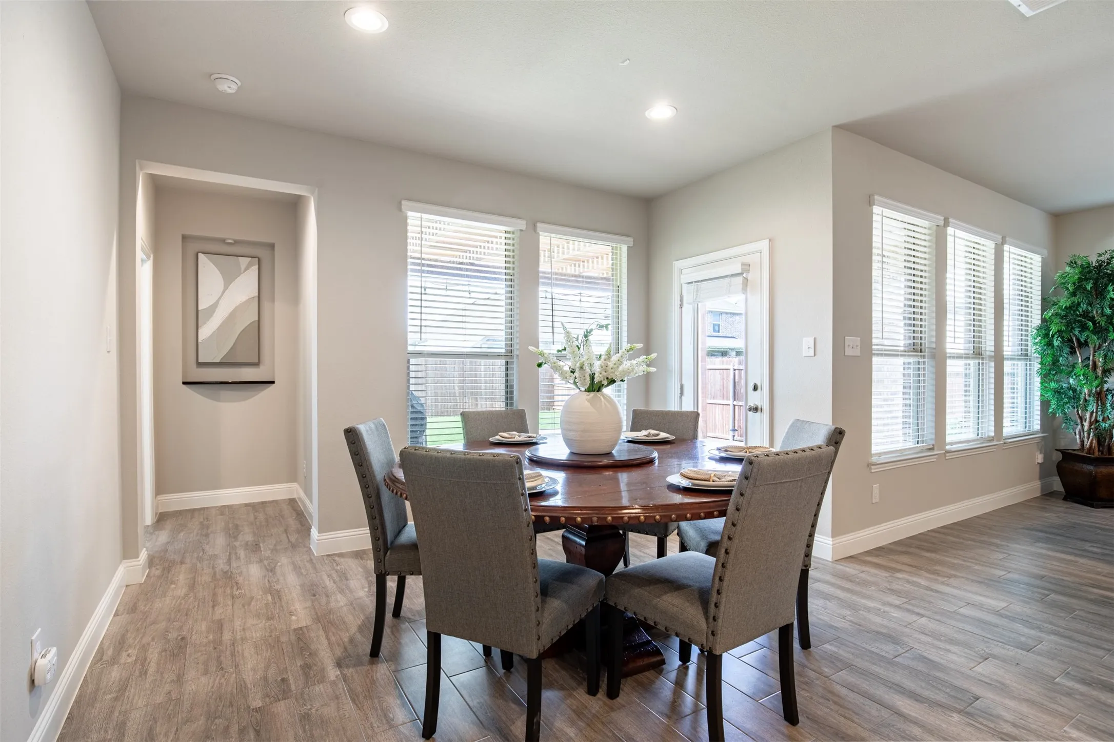 Large breakfast area that overlooks the back yard and patio.