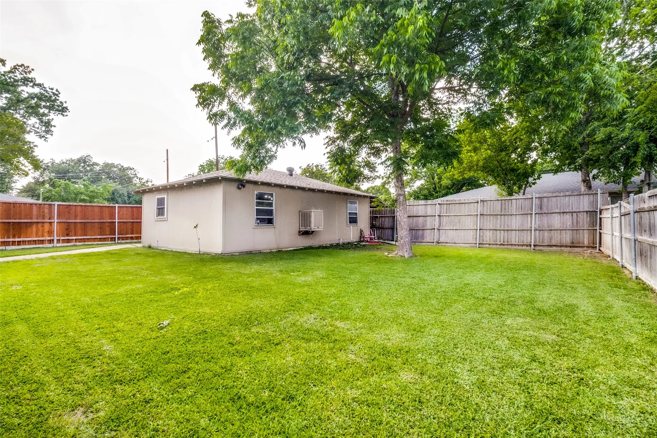 Expansive rear yard with detatched garage. Room to expand!
