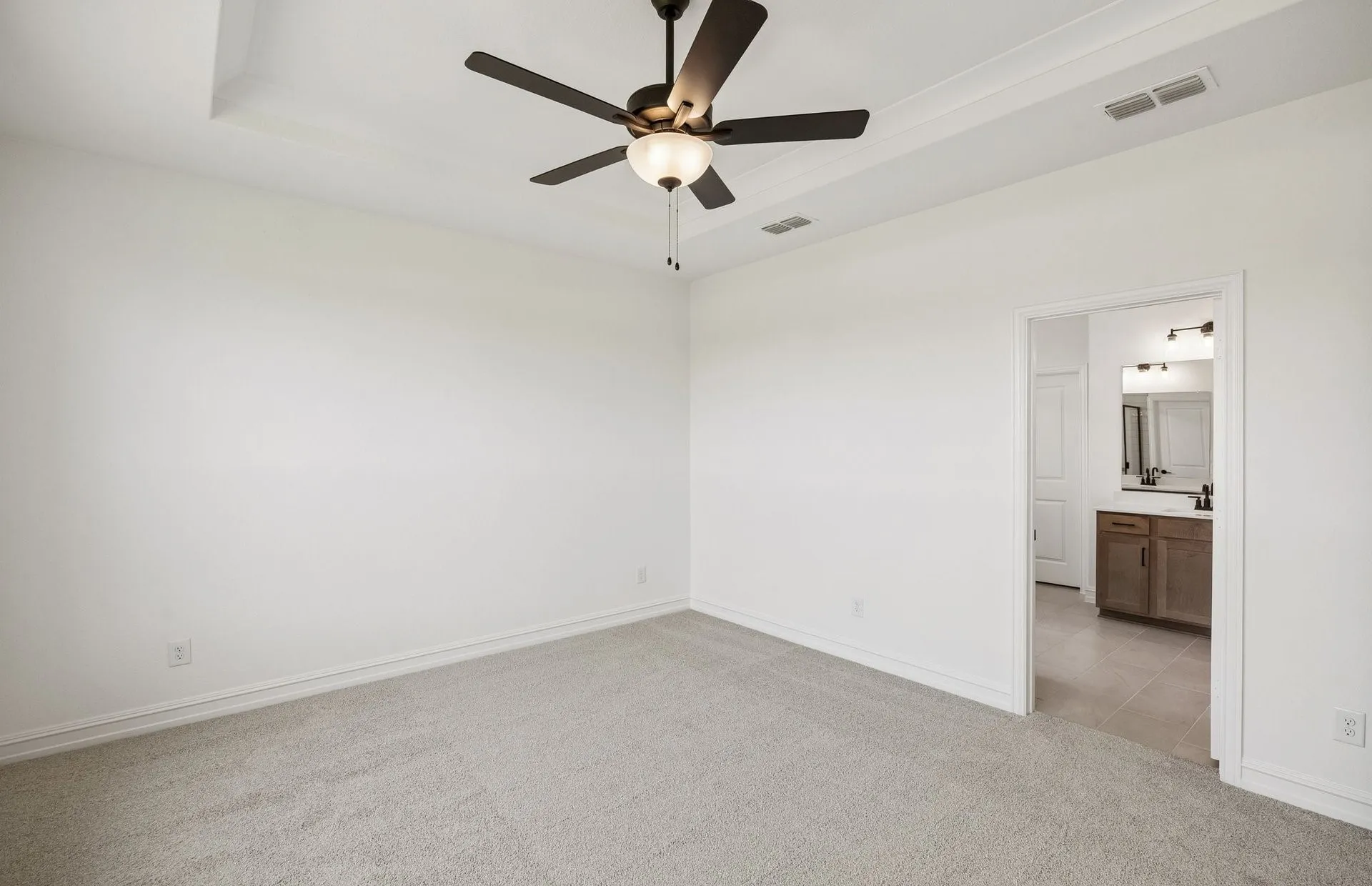 Spacious primary bedroom
