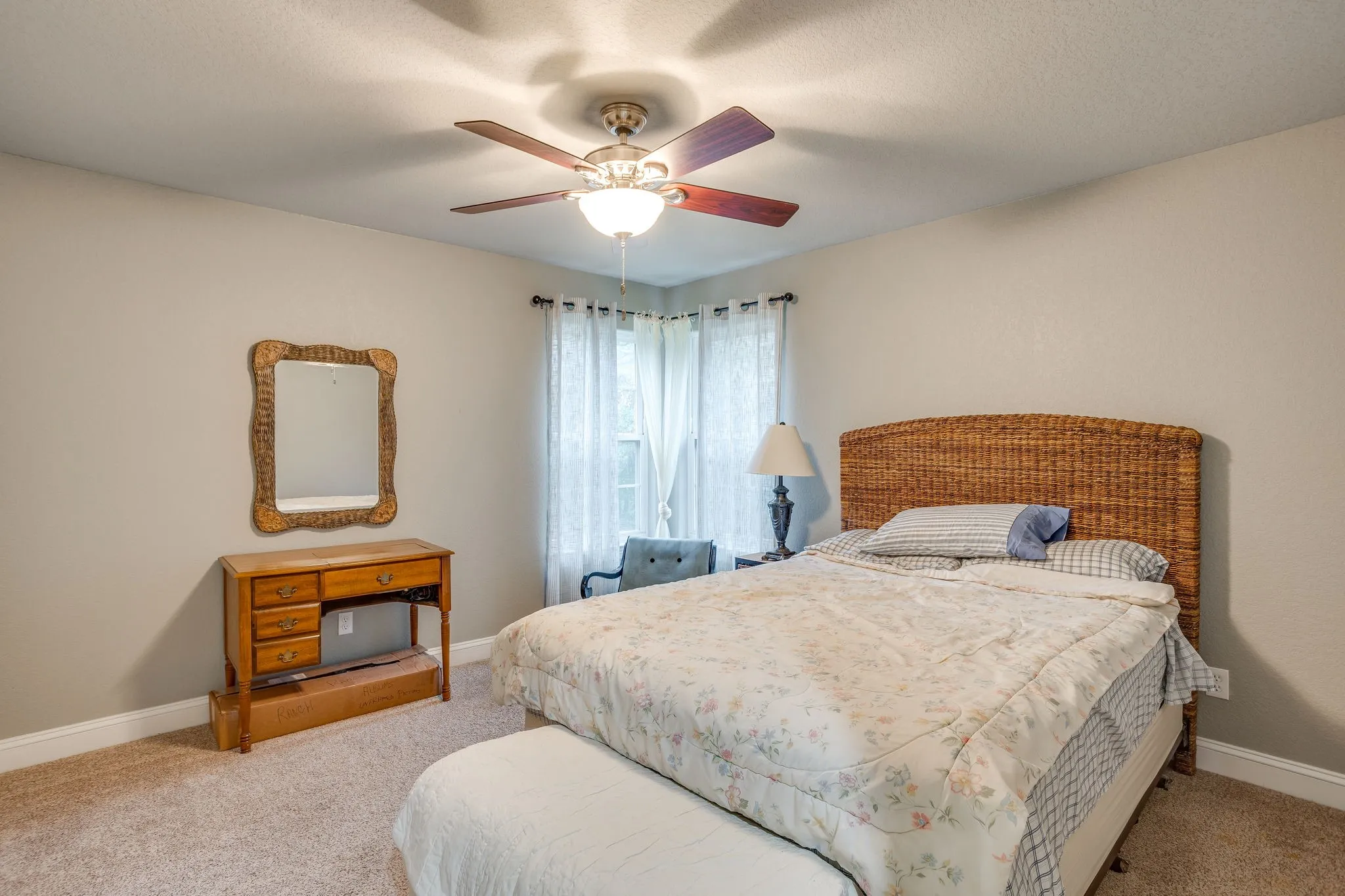 Bedroom featuring neutral-toned walls and carpet flooring