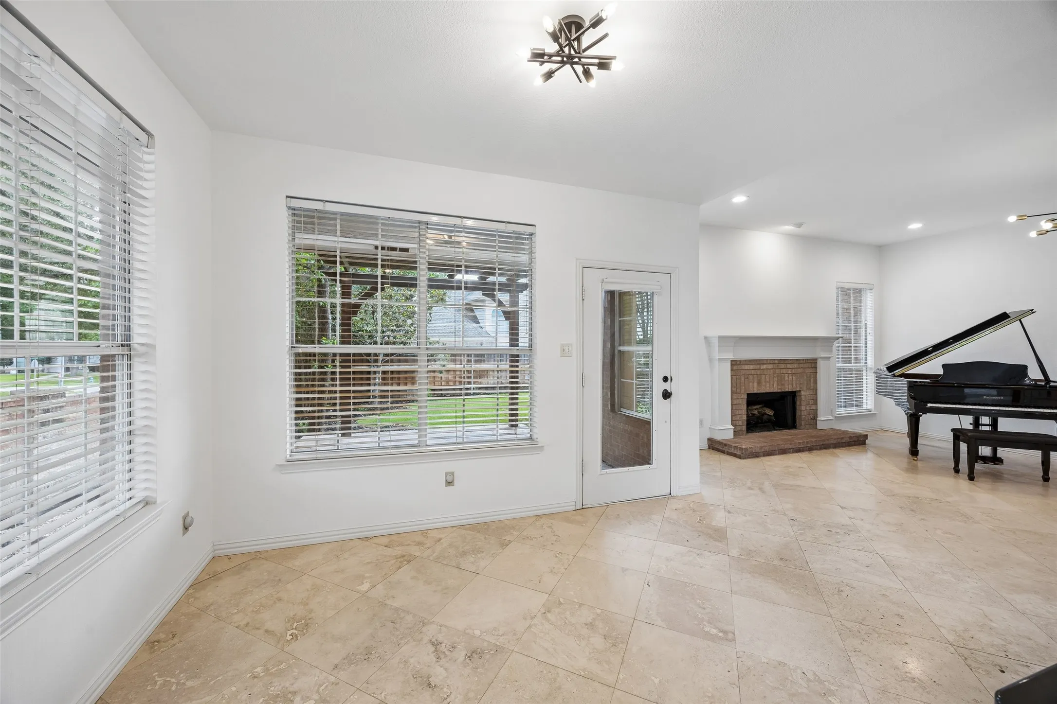 Spacious breakfast area open to family room, kitchen and open to back patio