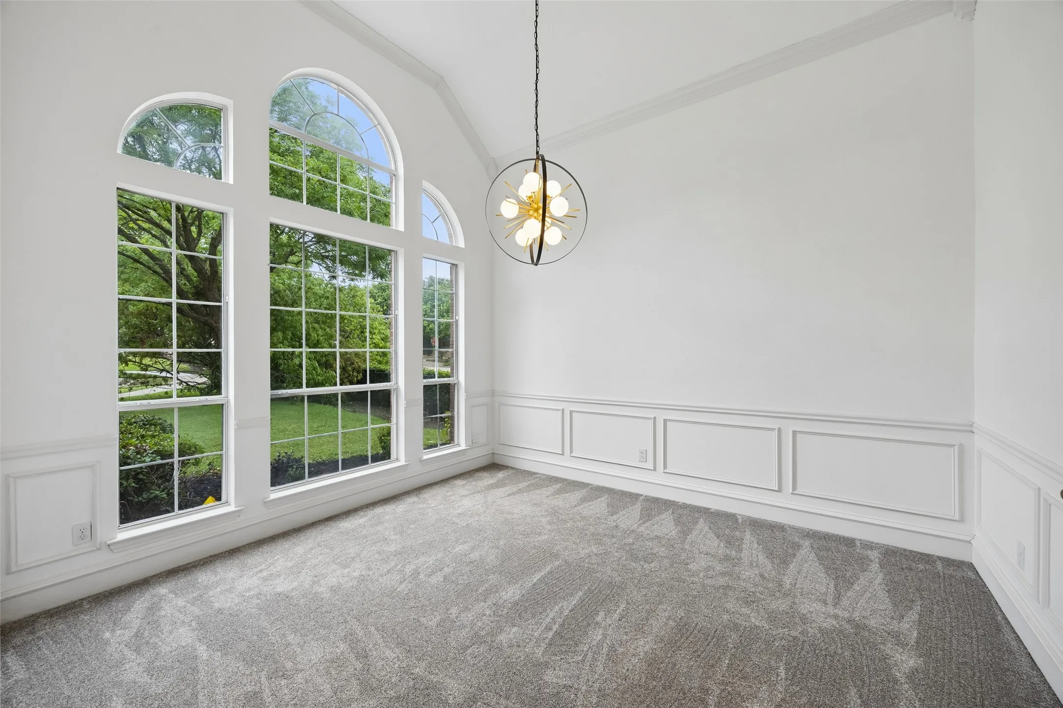 Vaulted ceiling with an architectural chandelier