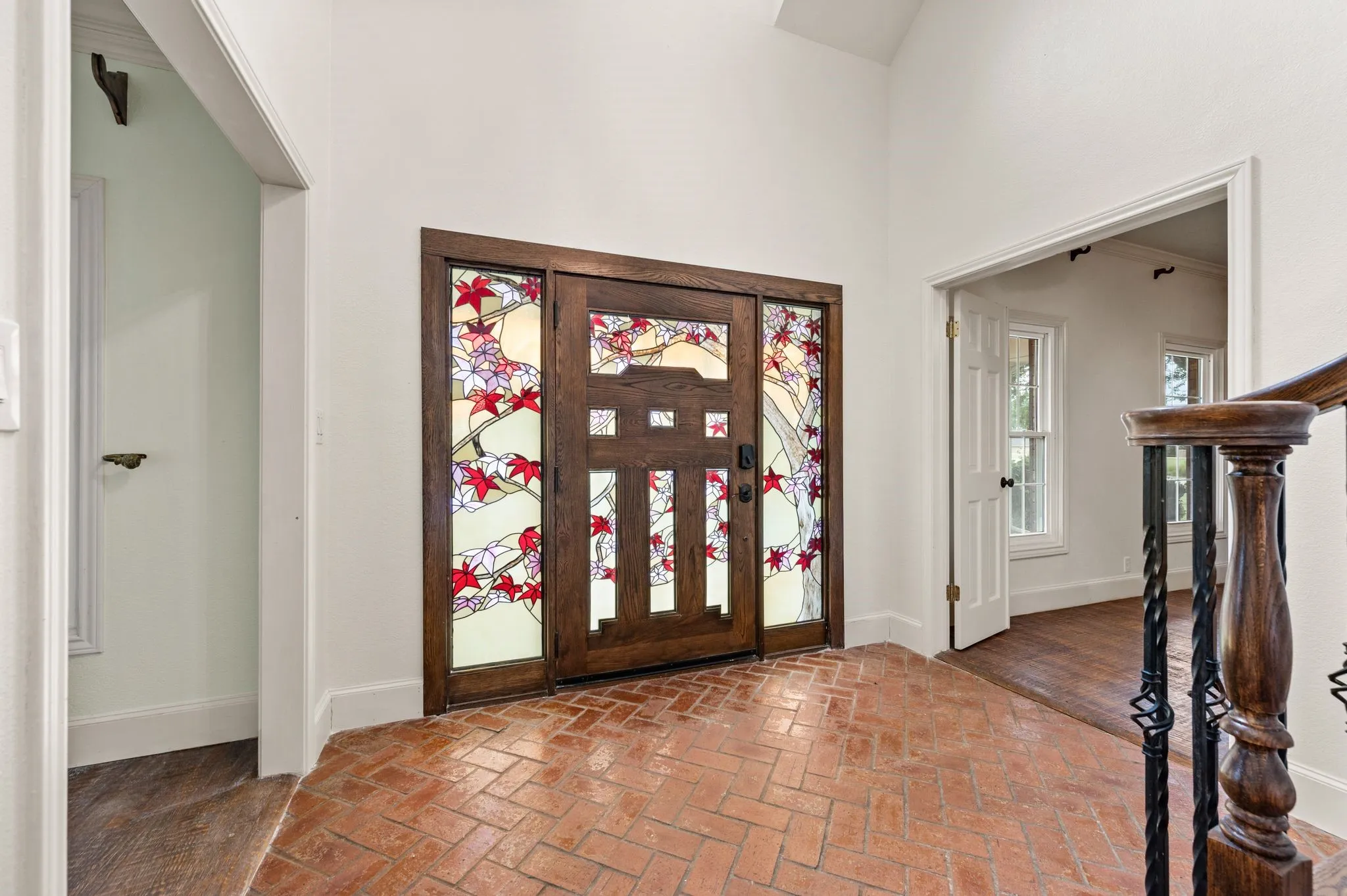 Beautiful, custom, heavy front entrance door with Japanese inspired stained glass.