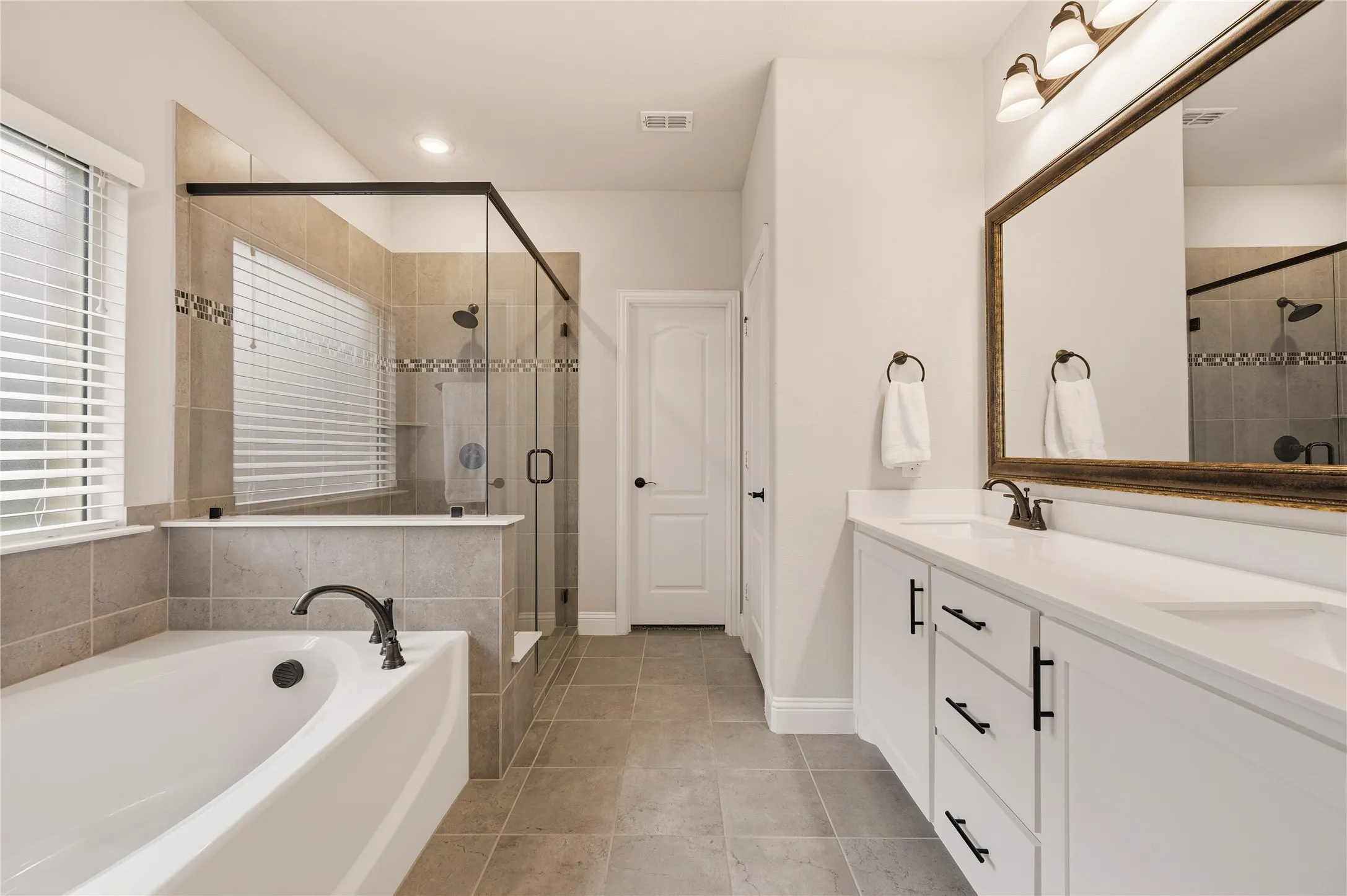 Downstairs garden tub and separate shower
