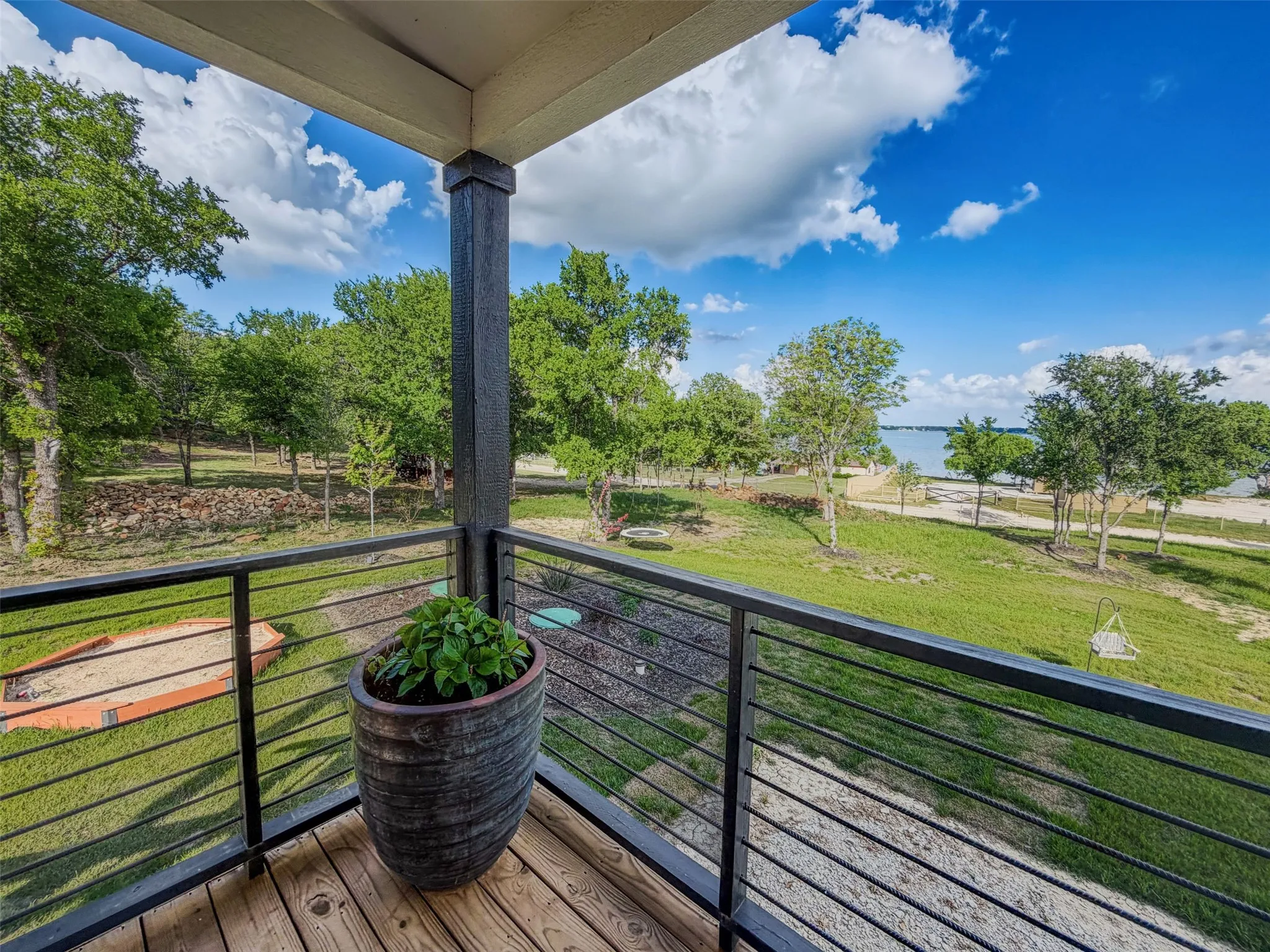 Spacious covered porch perfect for unwinding and soaking in the beauty of nature.