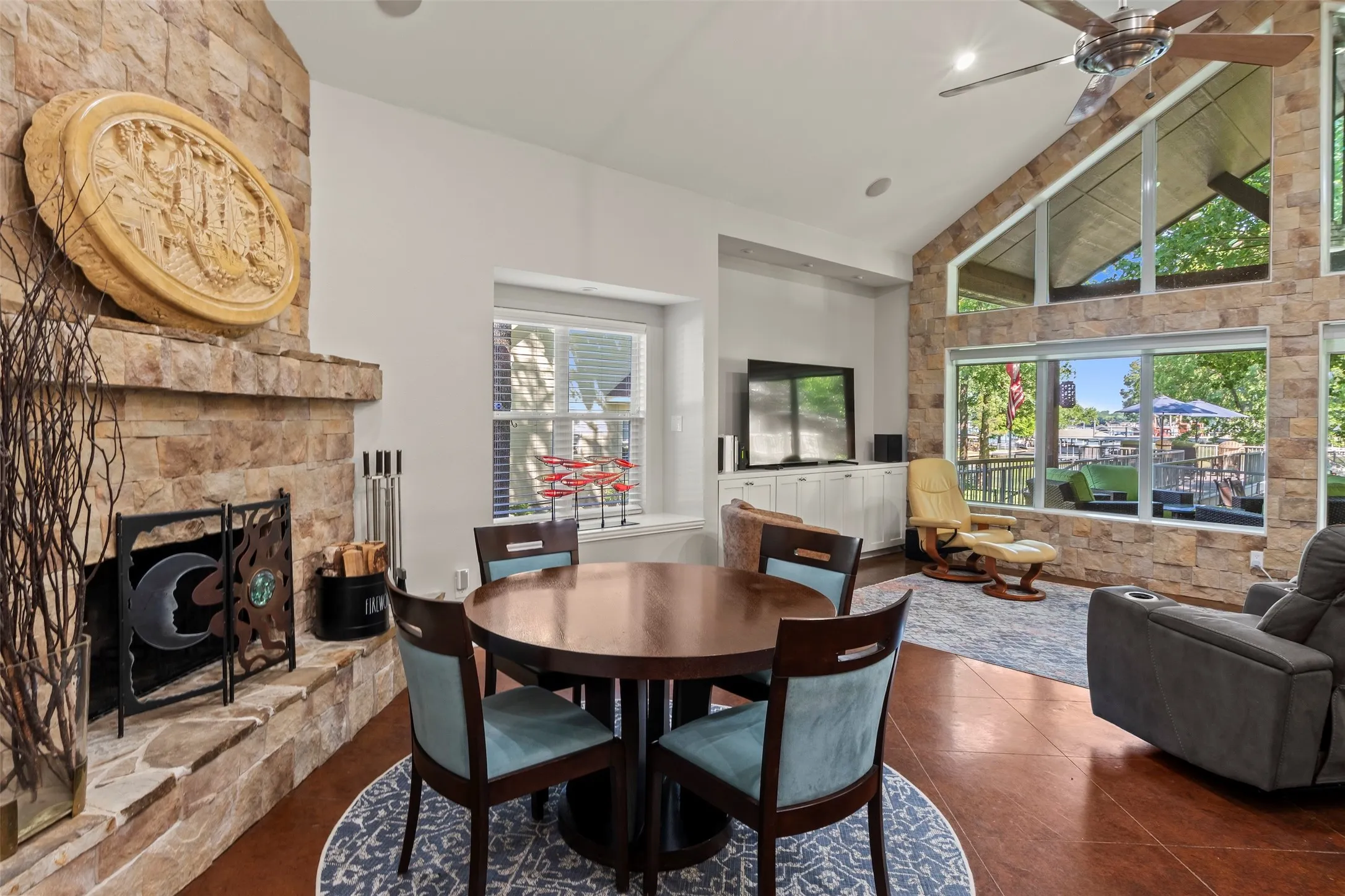 Stylish stone fireplace creates a warm and inviting atmosphere.