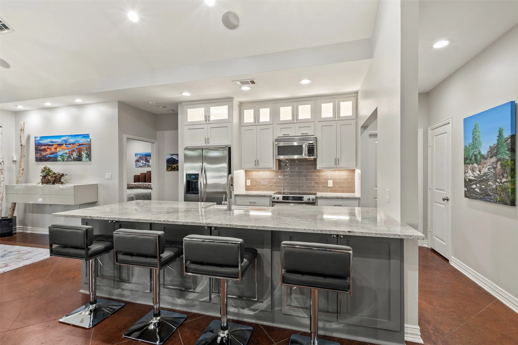 Subway tile backsplash and large island perfect for prep and gathering.