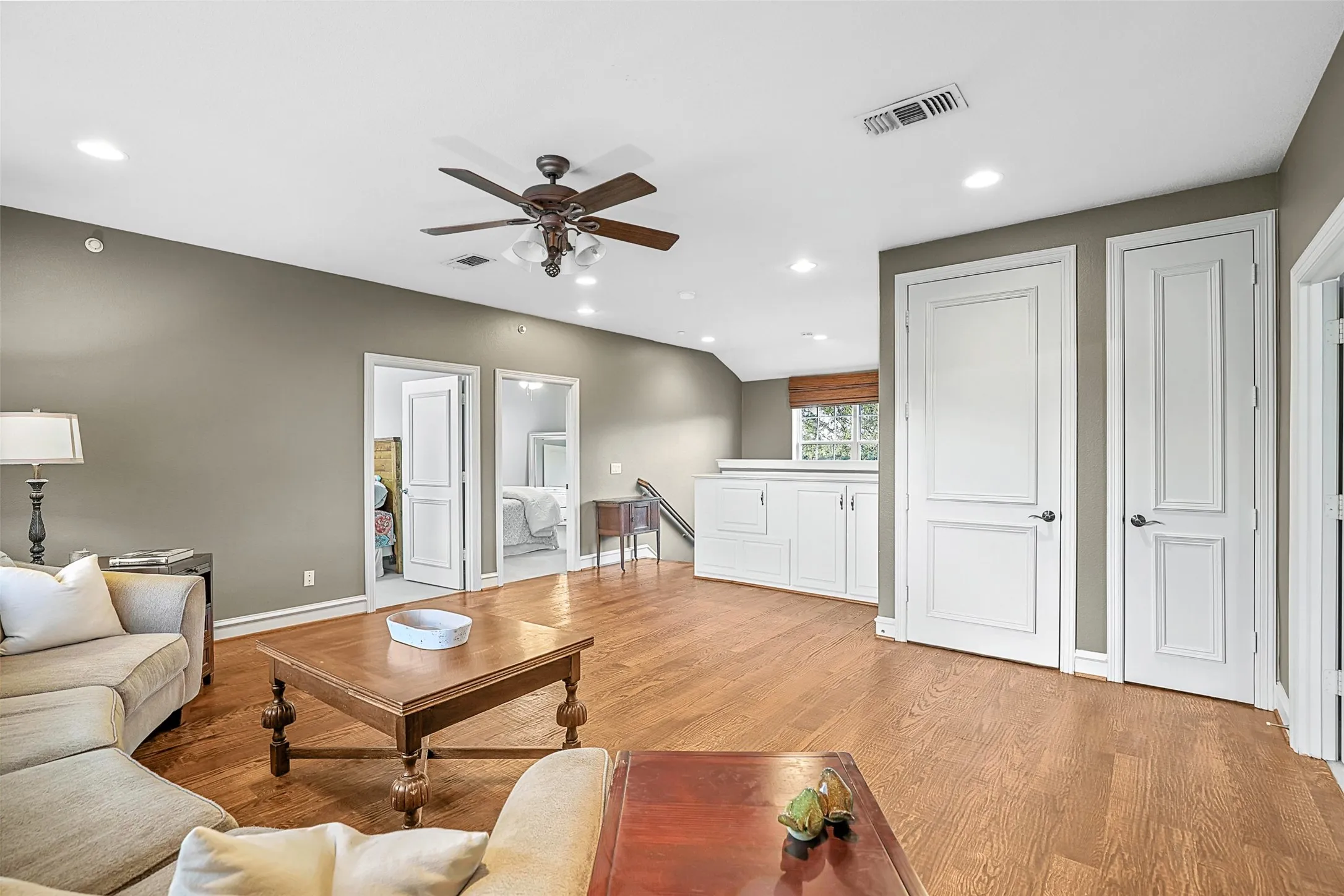 Upstairs gameroom is surrounded by three large bedrooms.