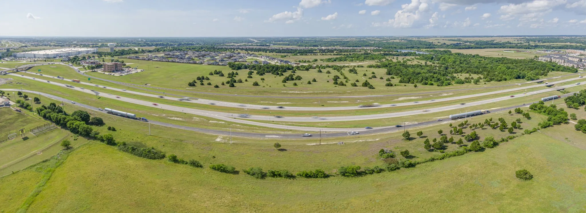 Shows the growing community surrounding this tract of land.  Housing developments across 287, Jerry Jones' Multi Use complex at 35 & 287, Schools, Apartments, Walgreens Distribution Center just south across 664!