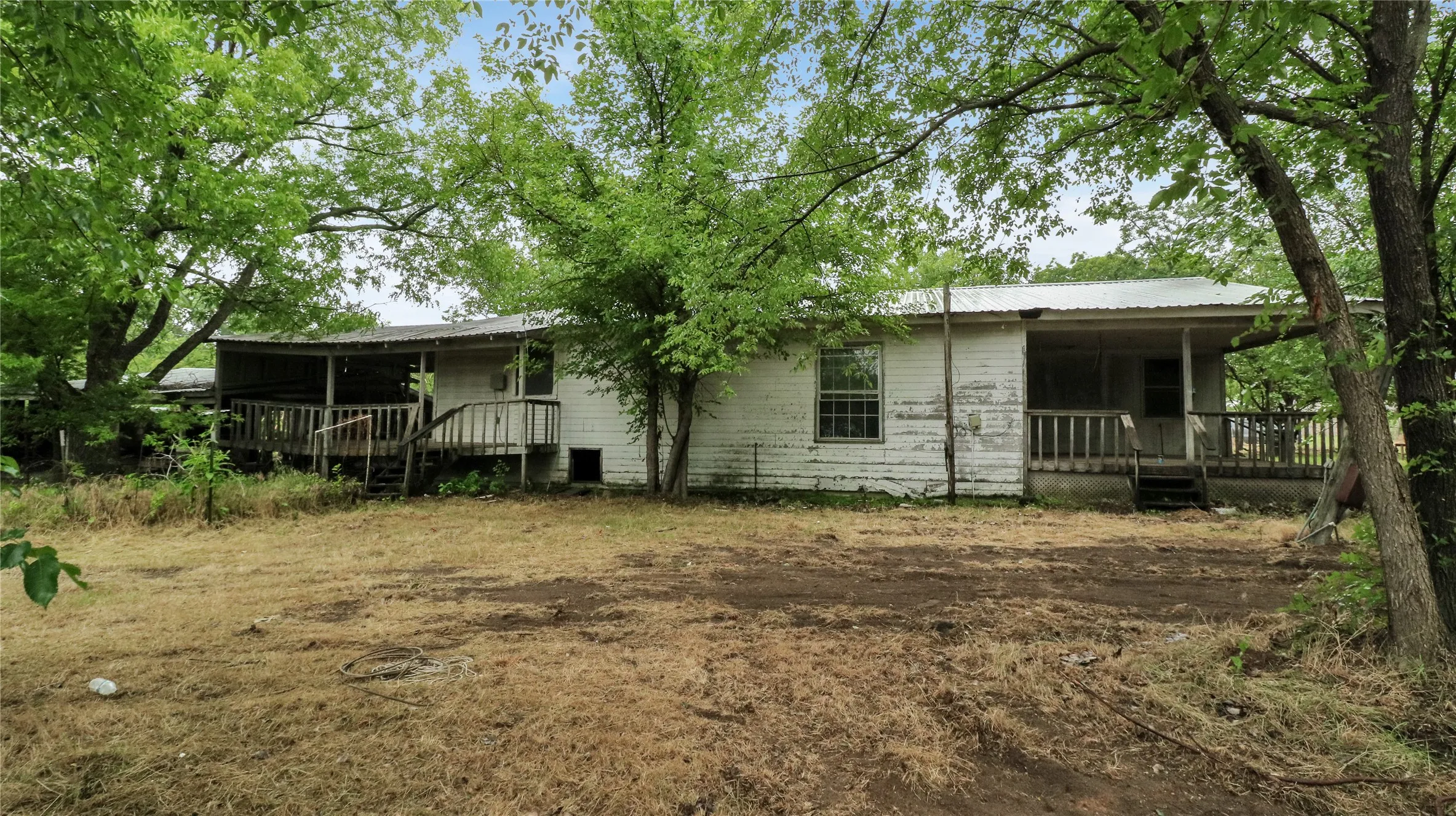 Mobile Home For Sale in Montague County , 306 Denver Road, Sunset, Texas 76270, 3 Bedroom, 2 Bathroom, Garage spaces, 2,632 Sqft, built in 1961, Price $99,900, mls#21278845, Real Estate Agent in Sunset, Homes For Sale in Montague county, Homes For Sale in Sunset, Realtor in Sunset Texas, Real Estate Brokerage Independent Realty Texas, Luminita Cordes Realtor