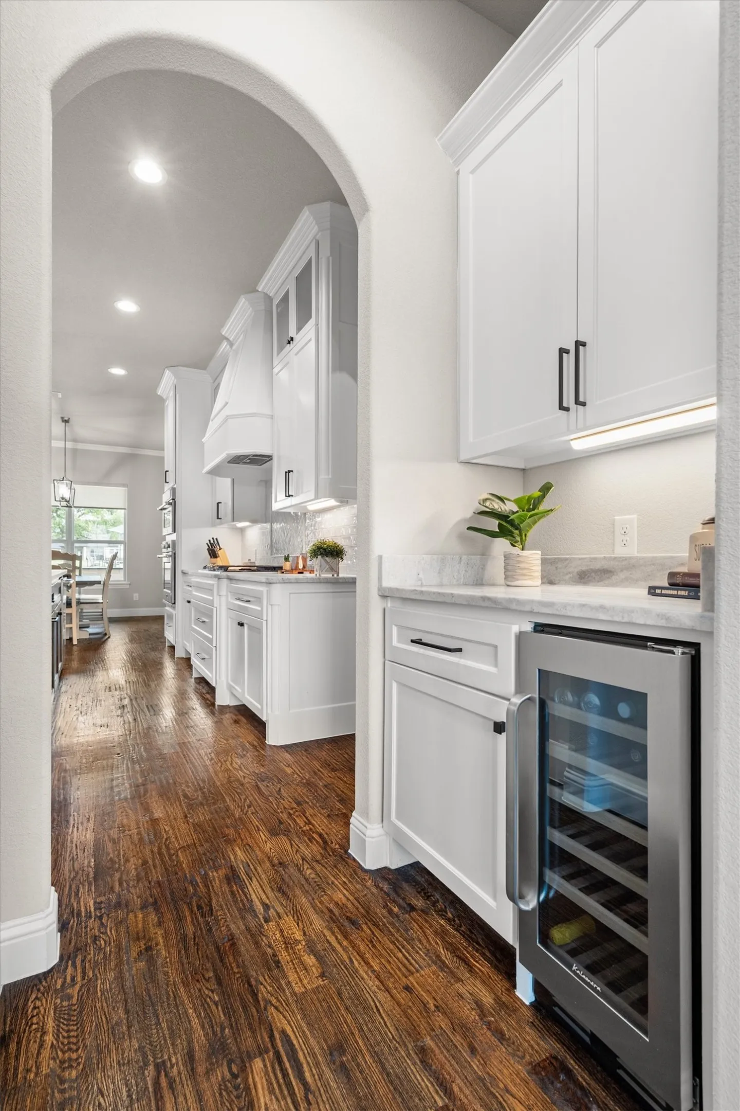 The butlers panty includes more storage and a wine refrigerator. (Works for Diet Coke as well!)