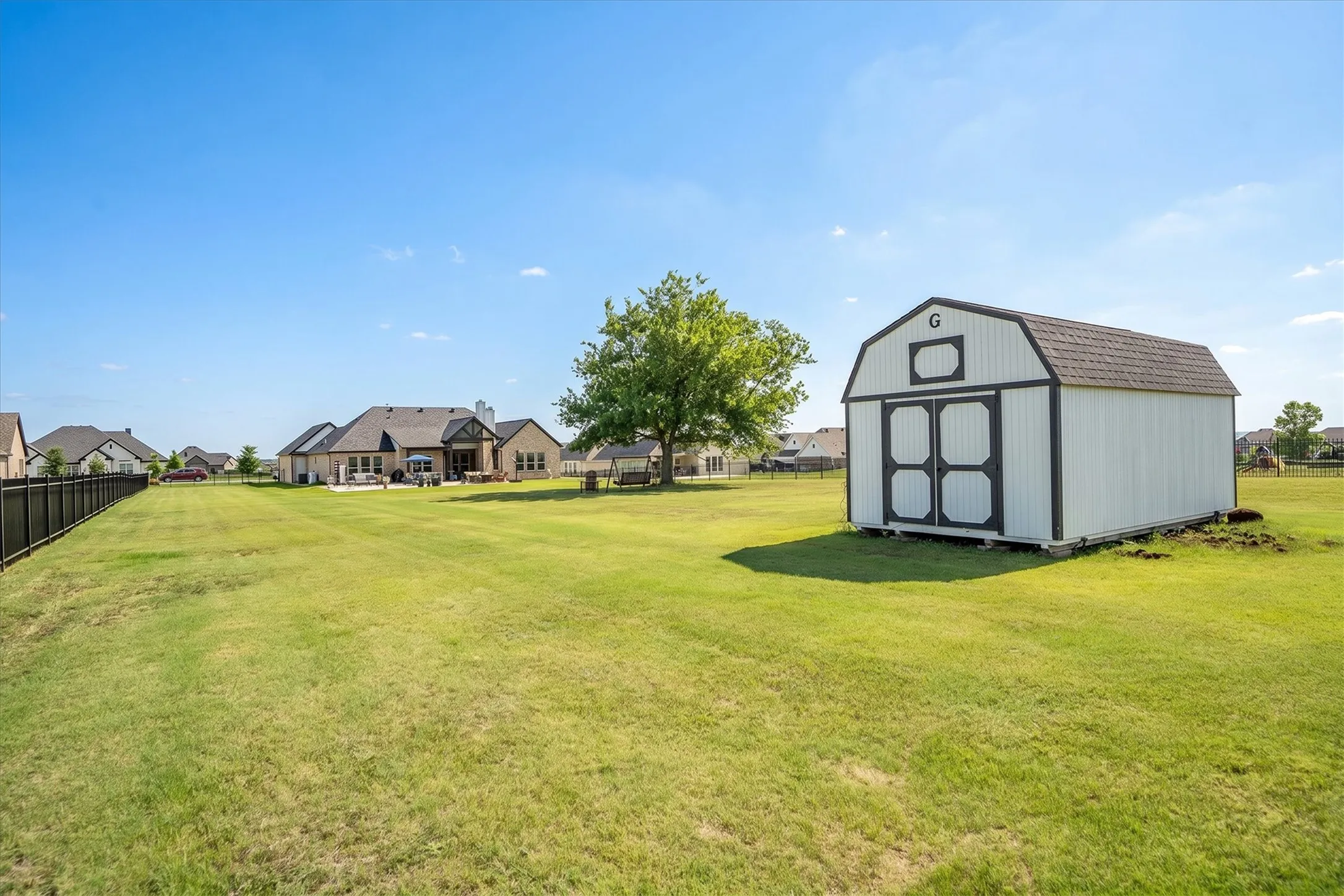 There is a large storage shed for your outdoor storage needs in addition to the oversized three car garage.