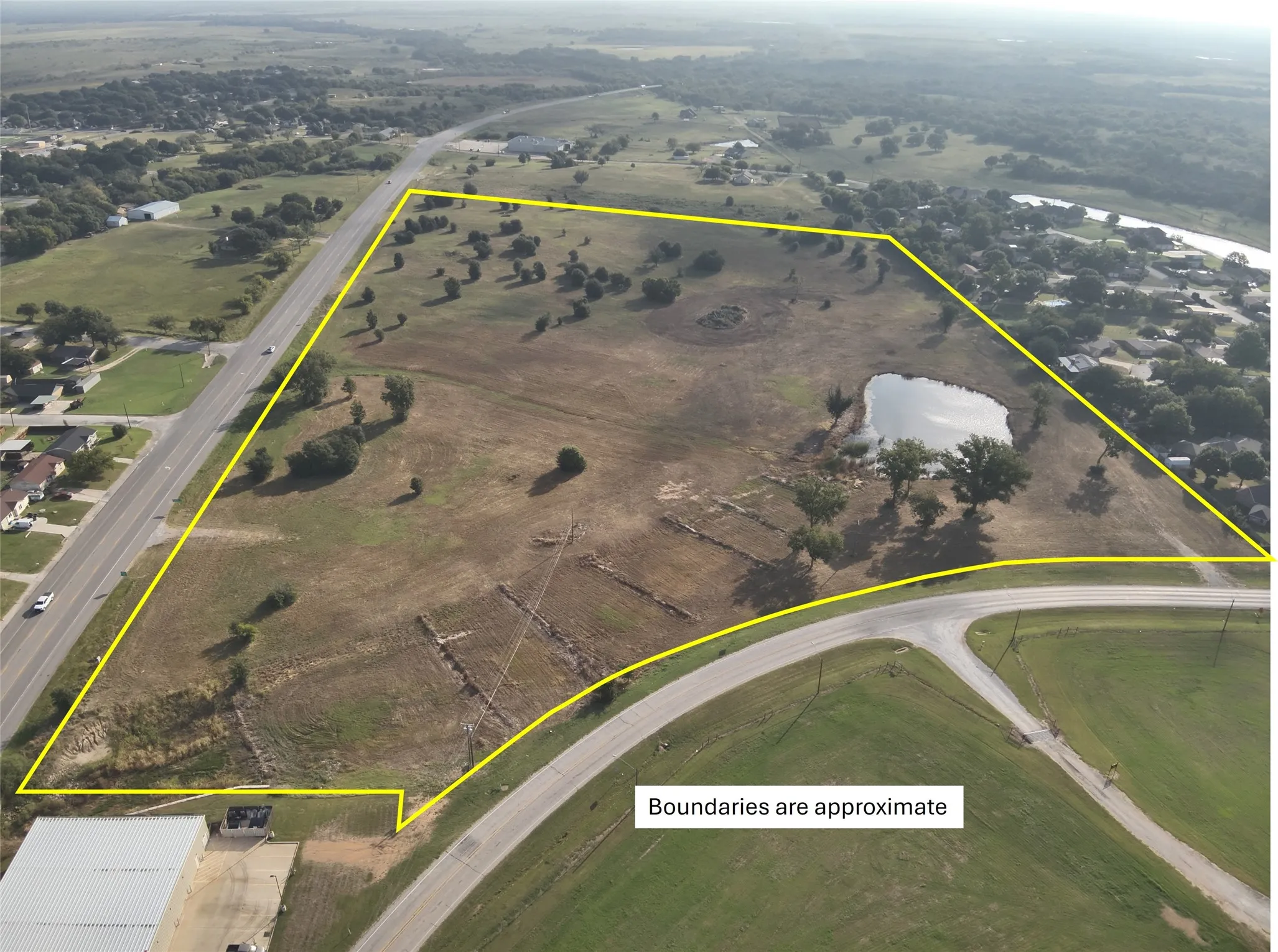 Aerial view of property's location featuring property parcel outlined