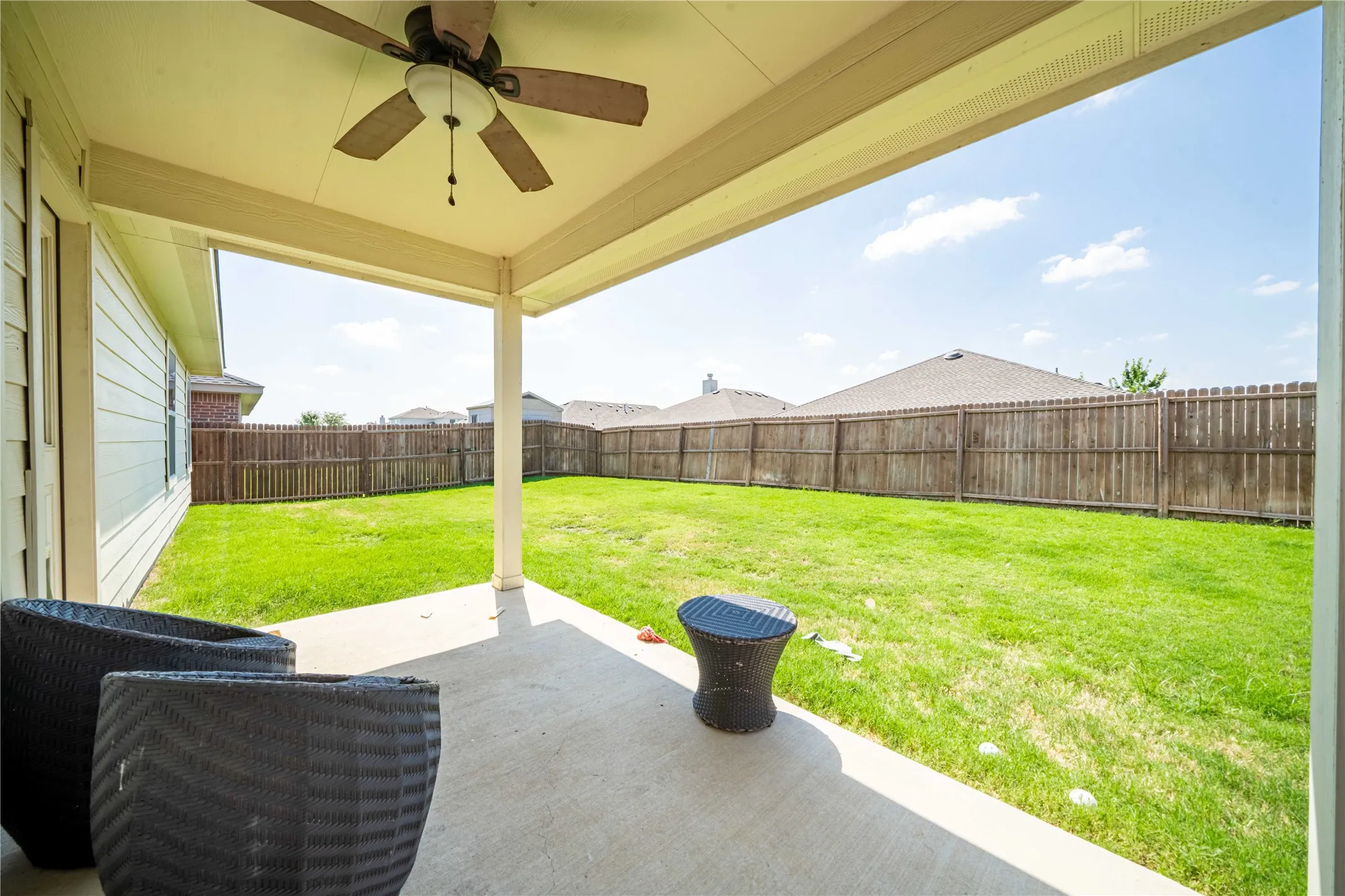 View of patio / terrace featuring ceiling fan