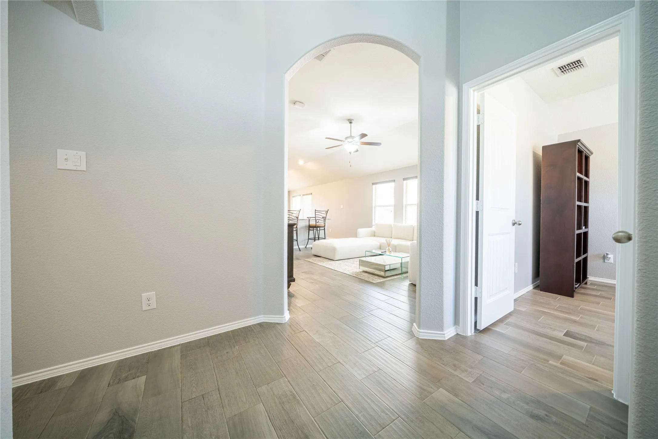 Hall featuring wood-type flooring