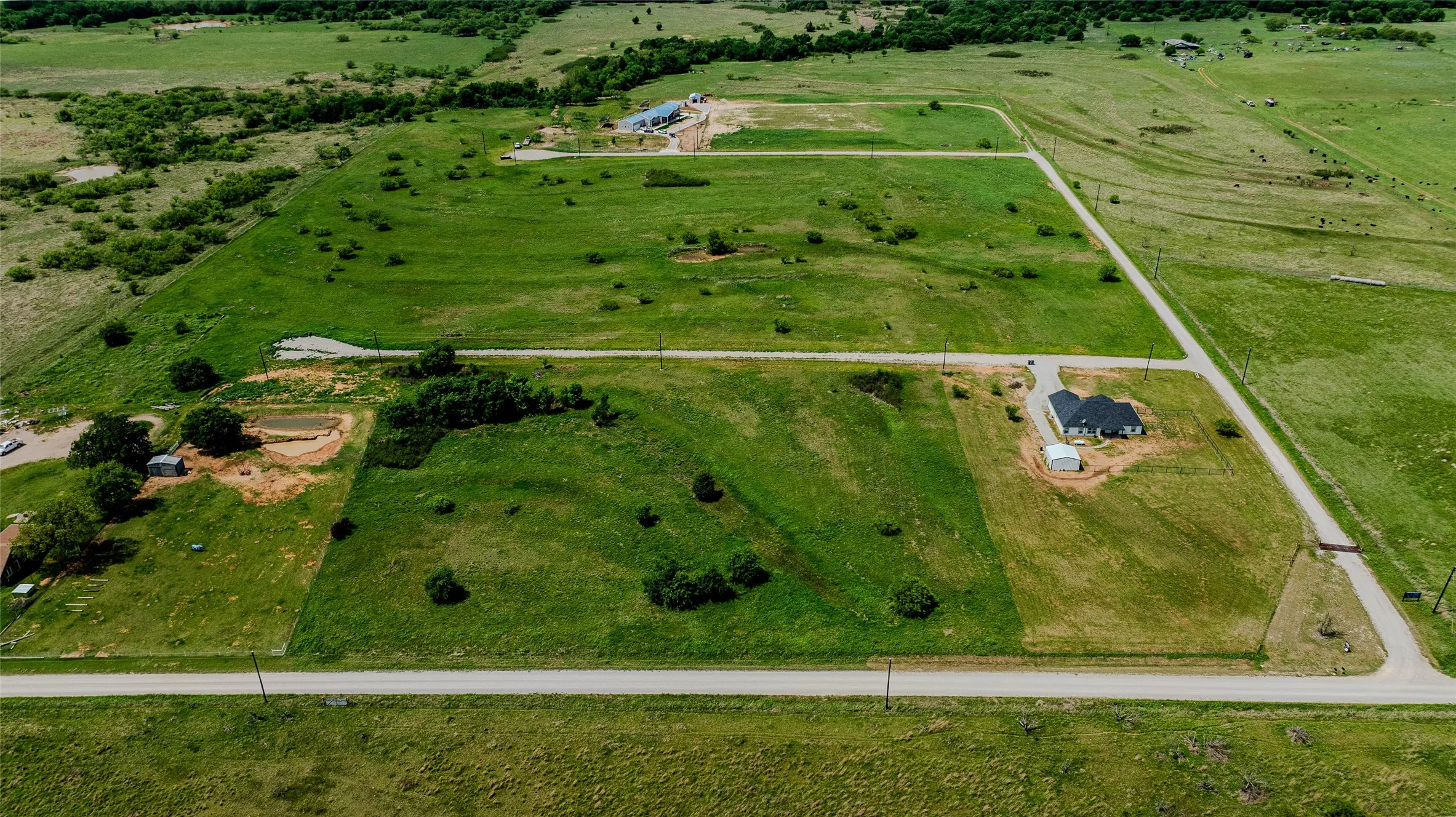 Expansive acreage with established gravel road access