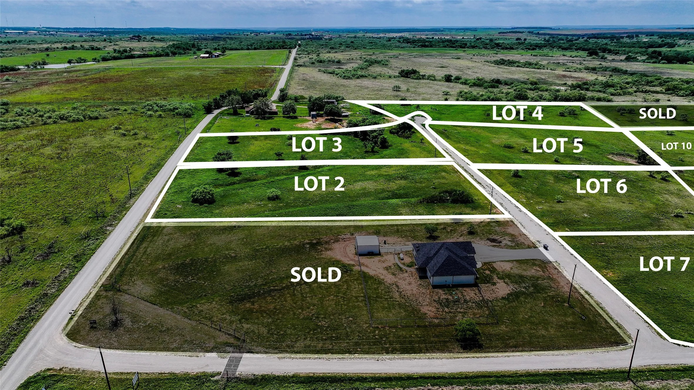 Aerial perspective showcasing multiple land lots
