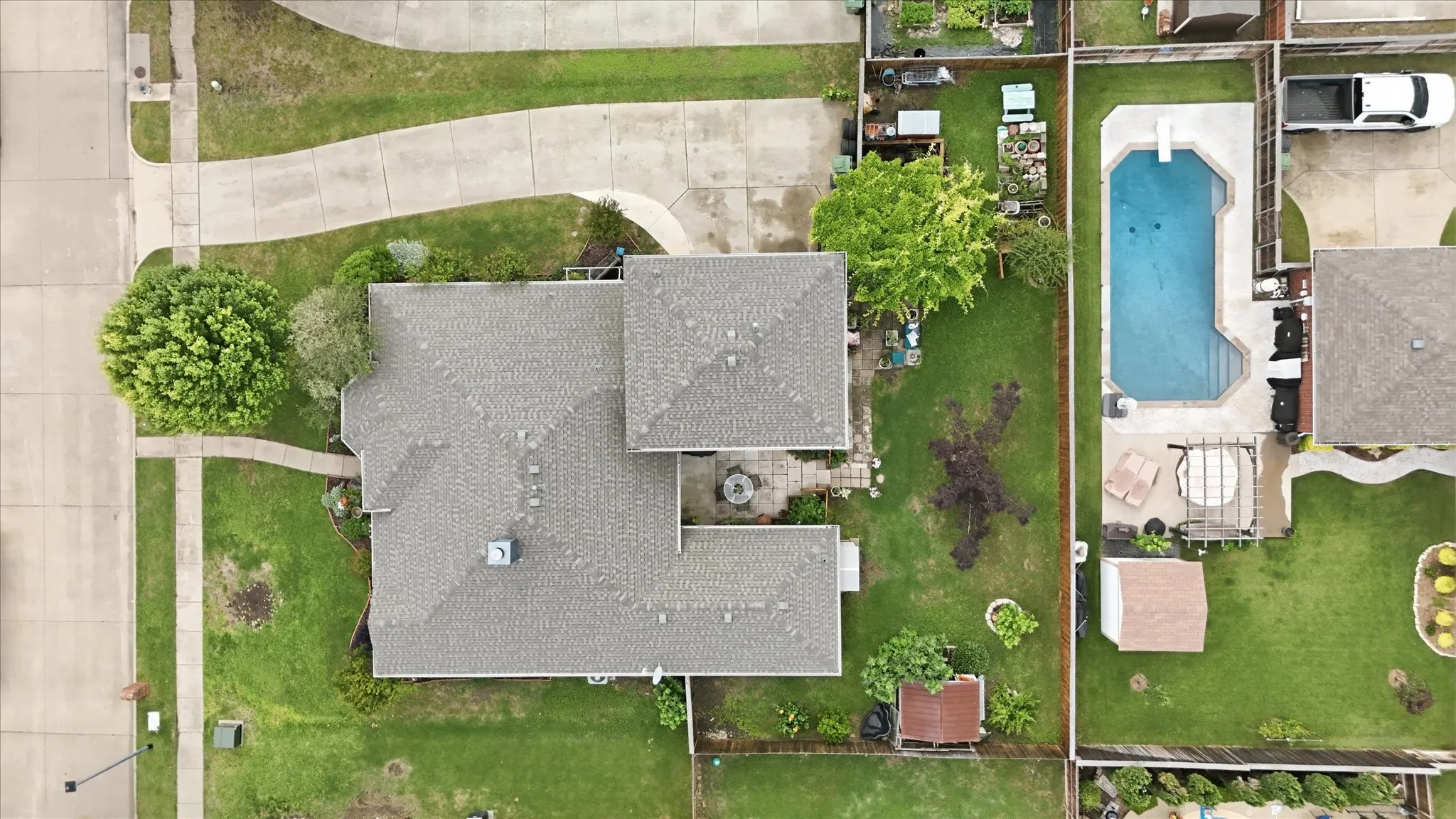 Aerial featuring extended drive & parking