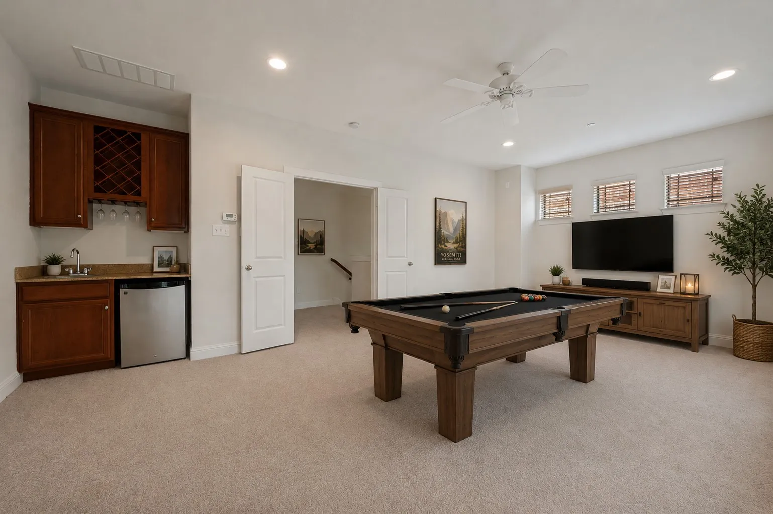 The entire third floor is a large flexible room with a wetbar.