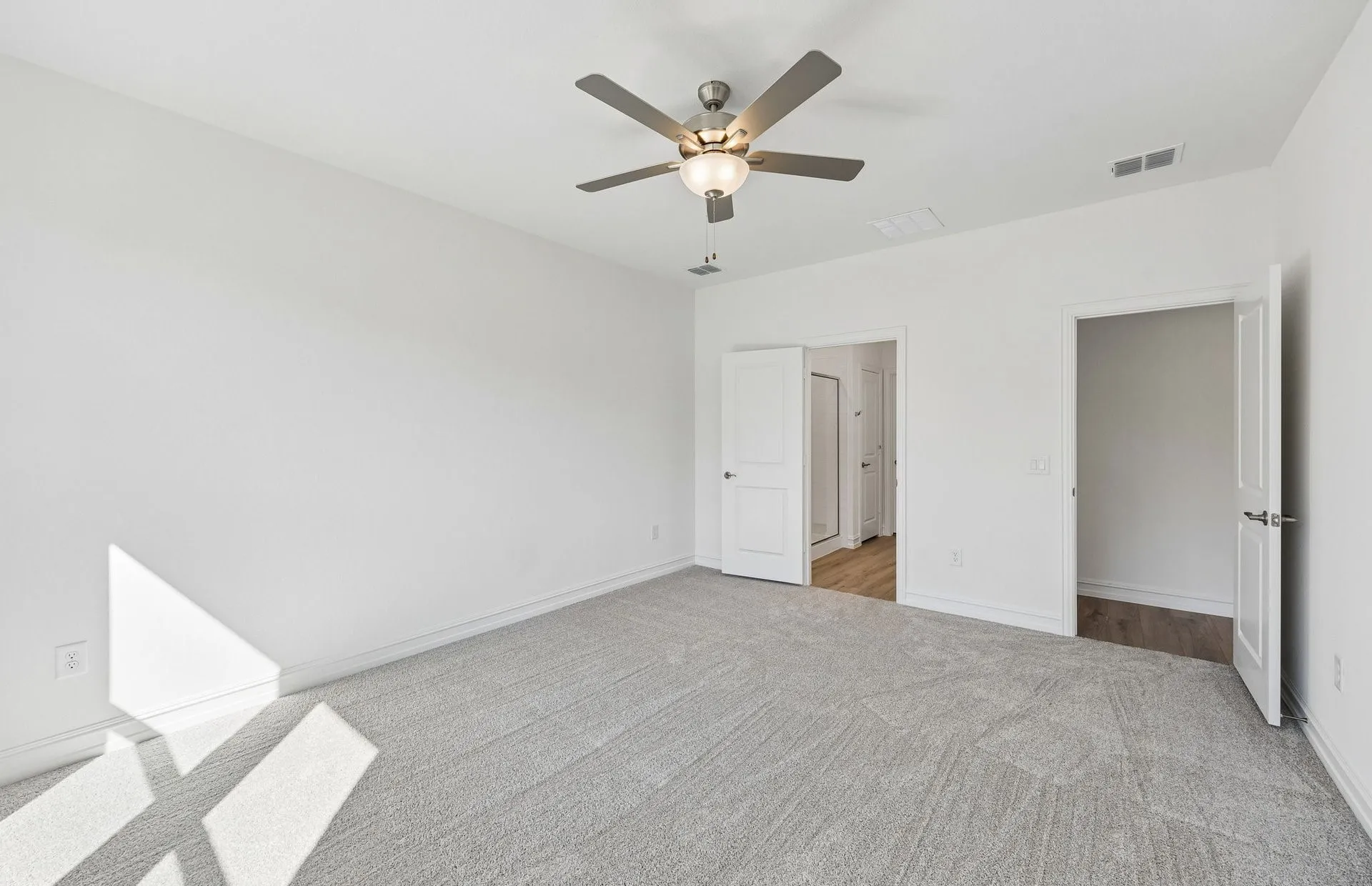 Spacious primary bedroom