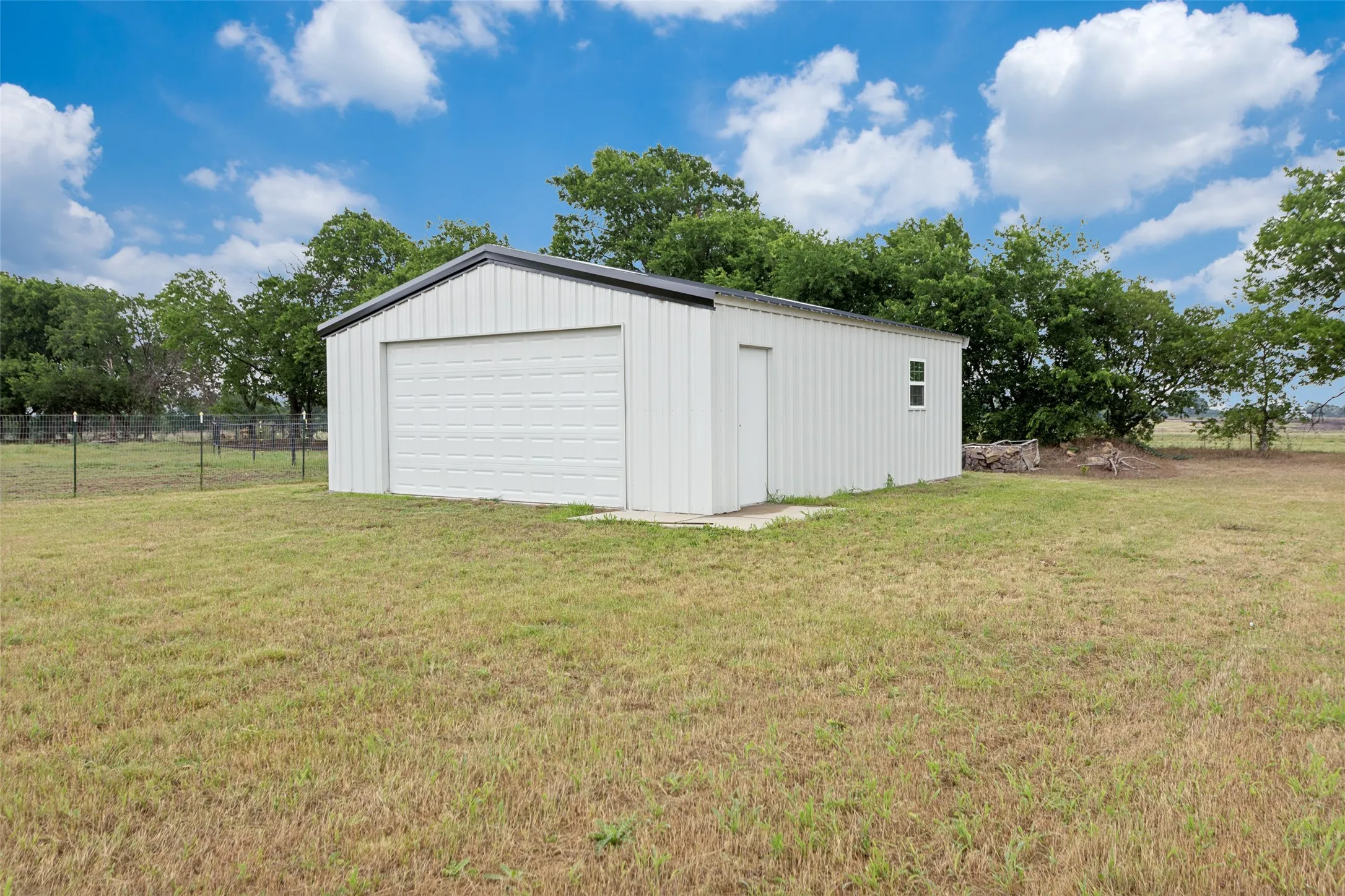 Very large storage building at the back of the property