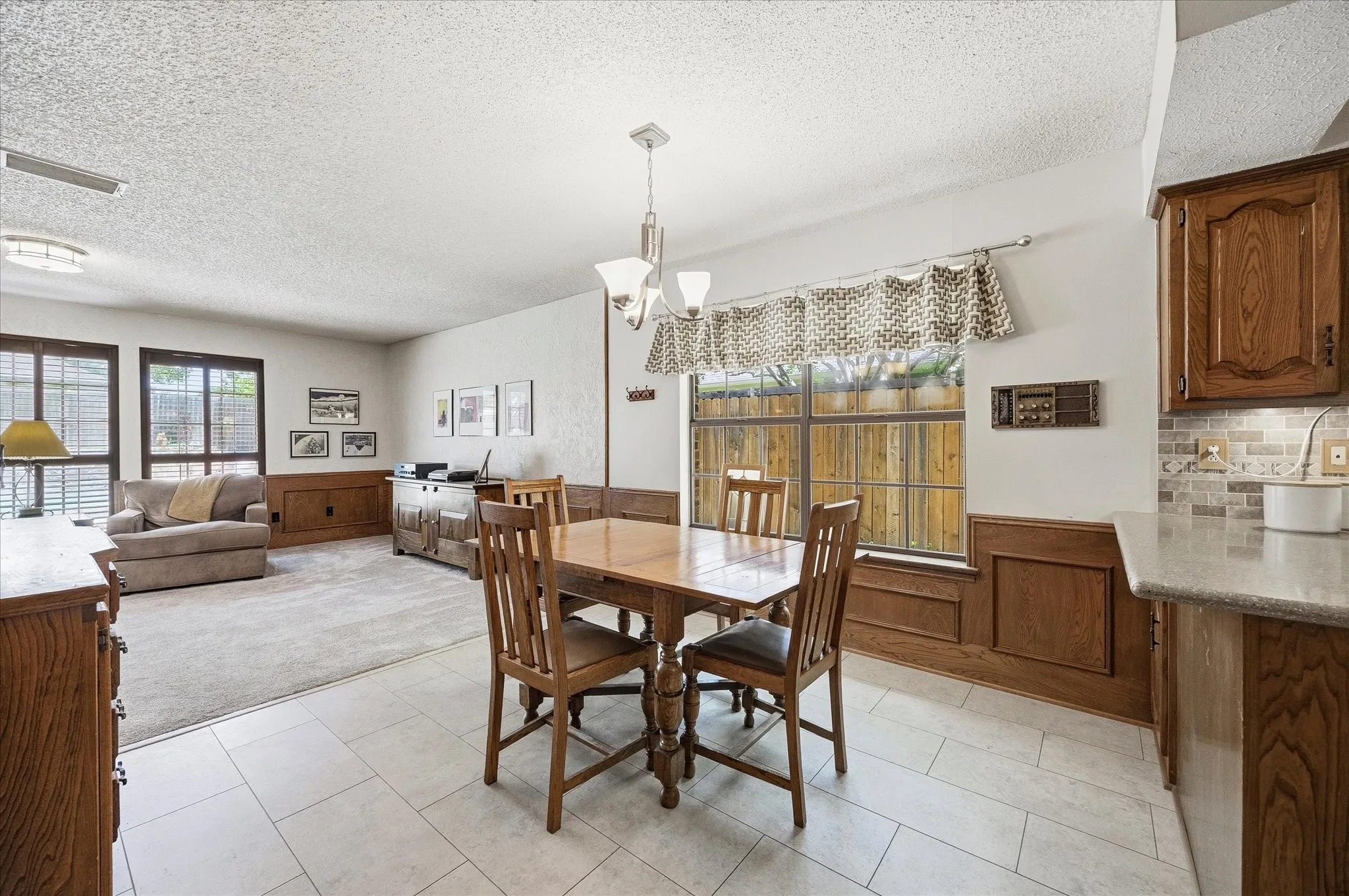 Breakfast room overlooks kitchen and morning room