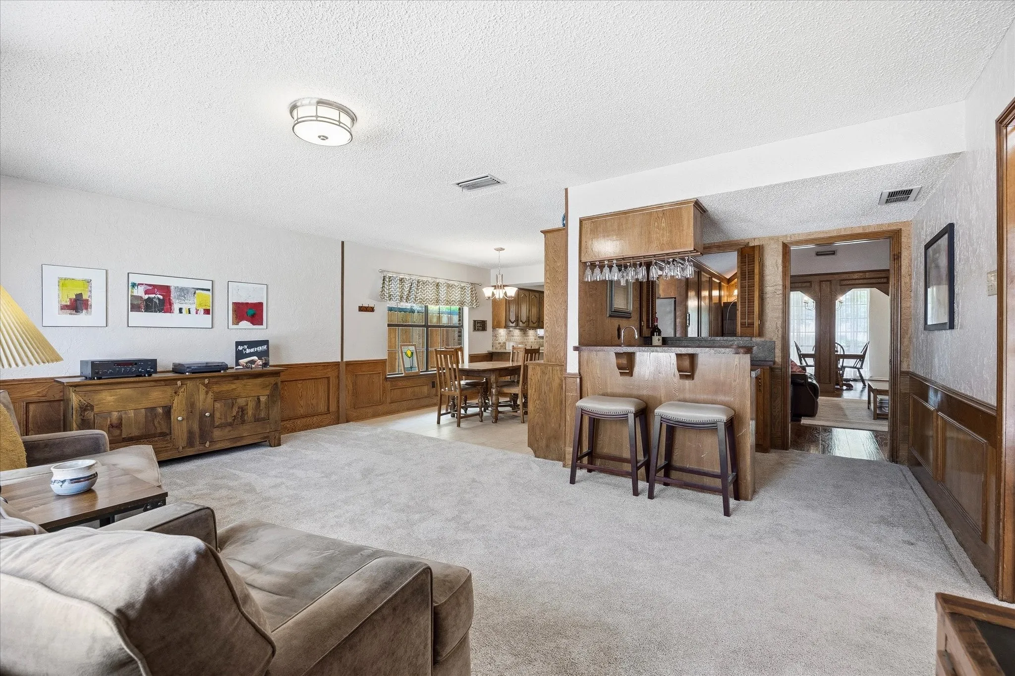 2n living-game room includes wet refreshment bar